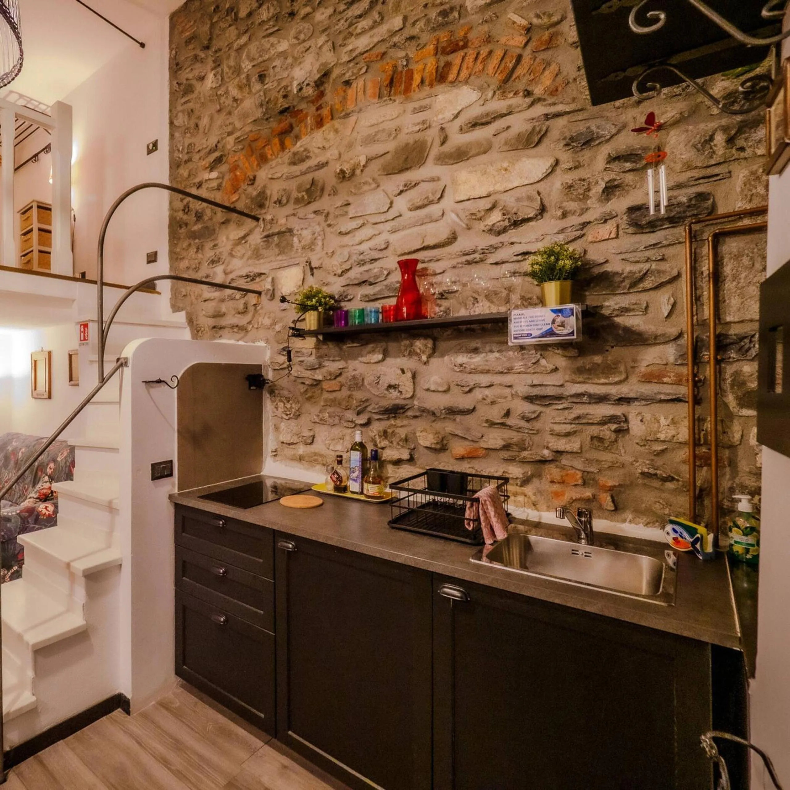 Kitchen or kitchenette in Petrella's Point Studio with AC