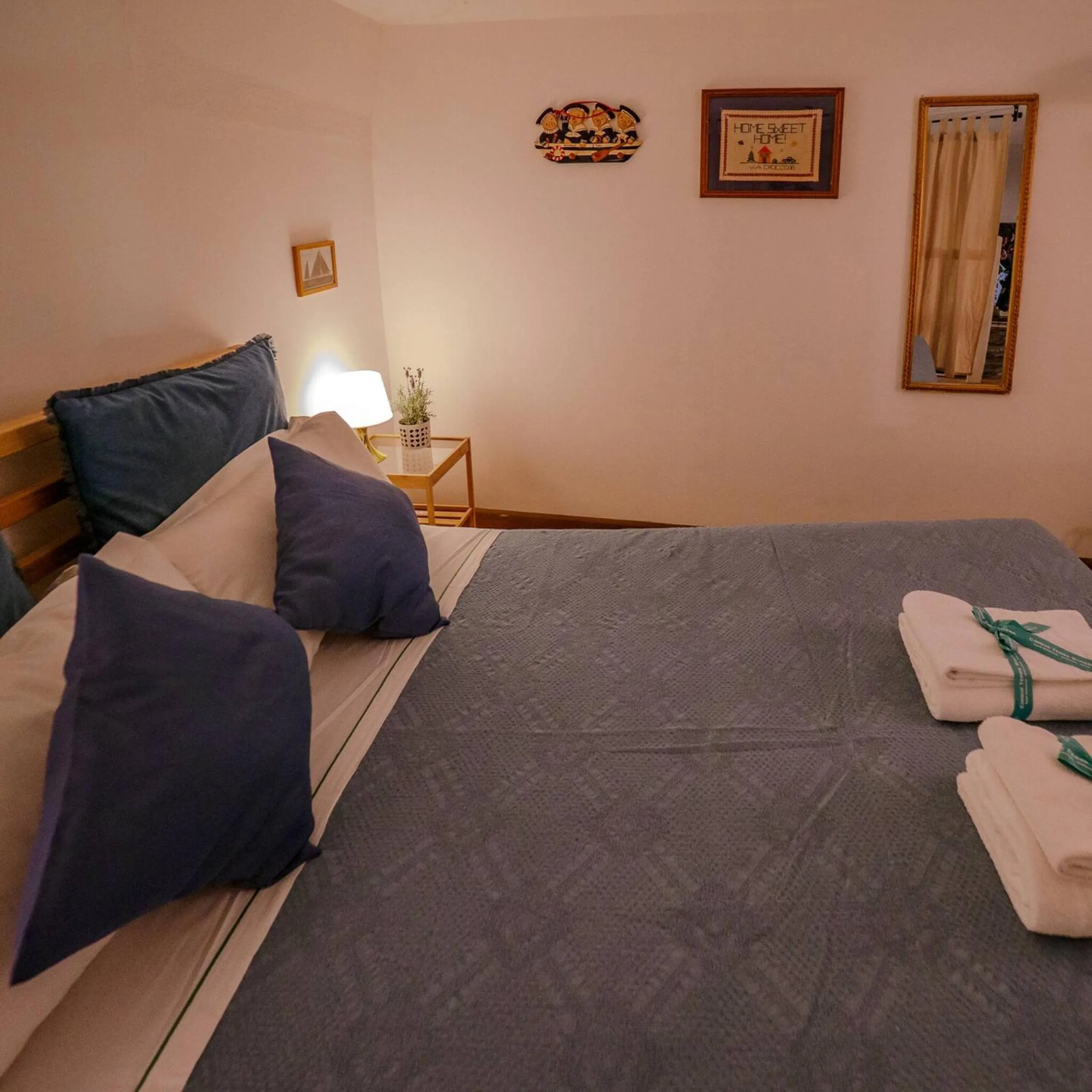 Bed in Petrella's Point Studio with AC