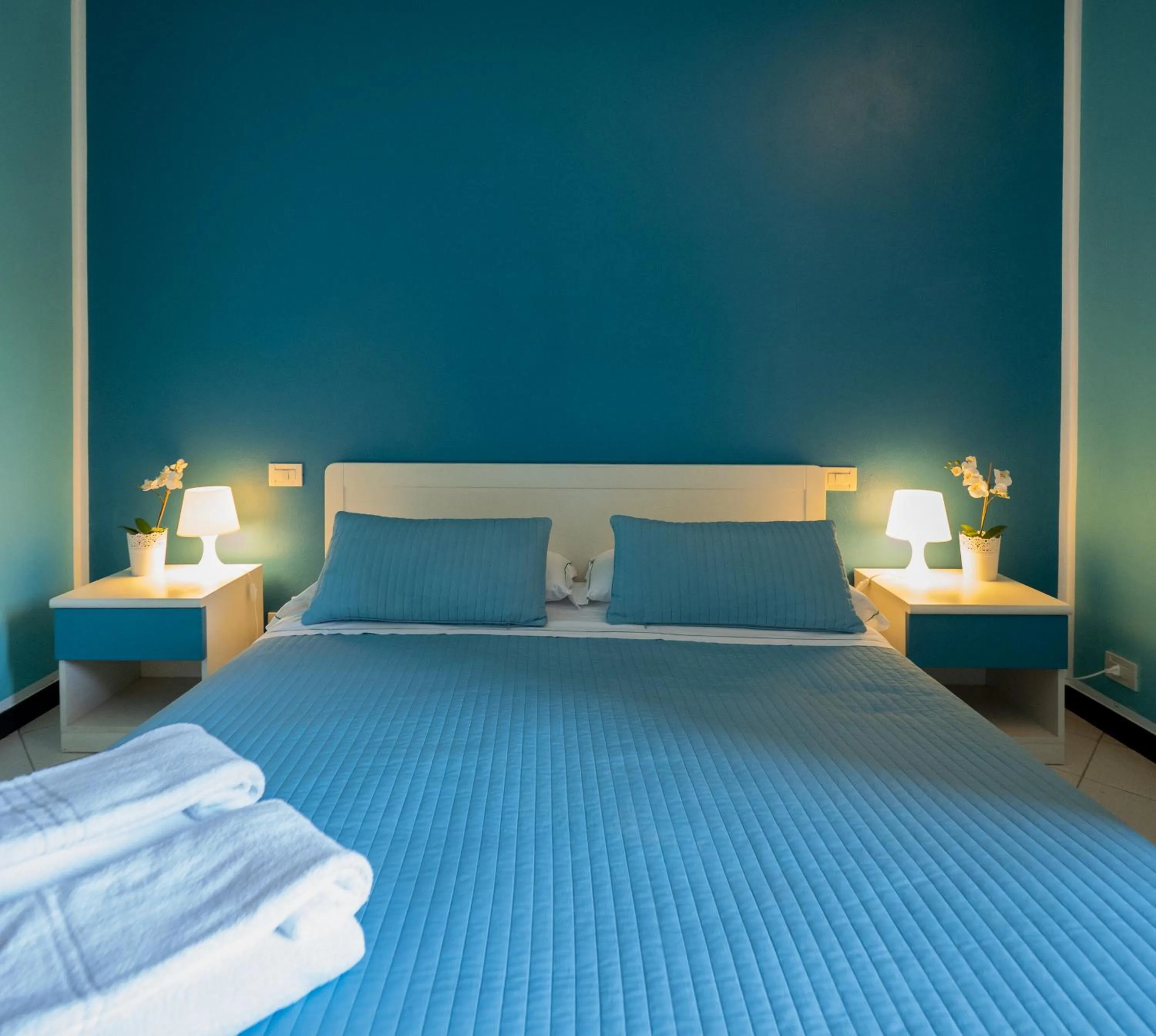 Bed in Ventegà Sea View Apartment with Balcony