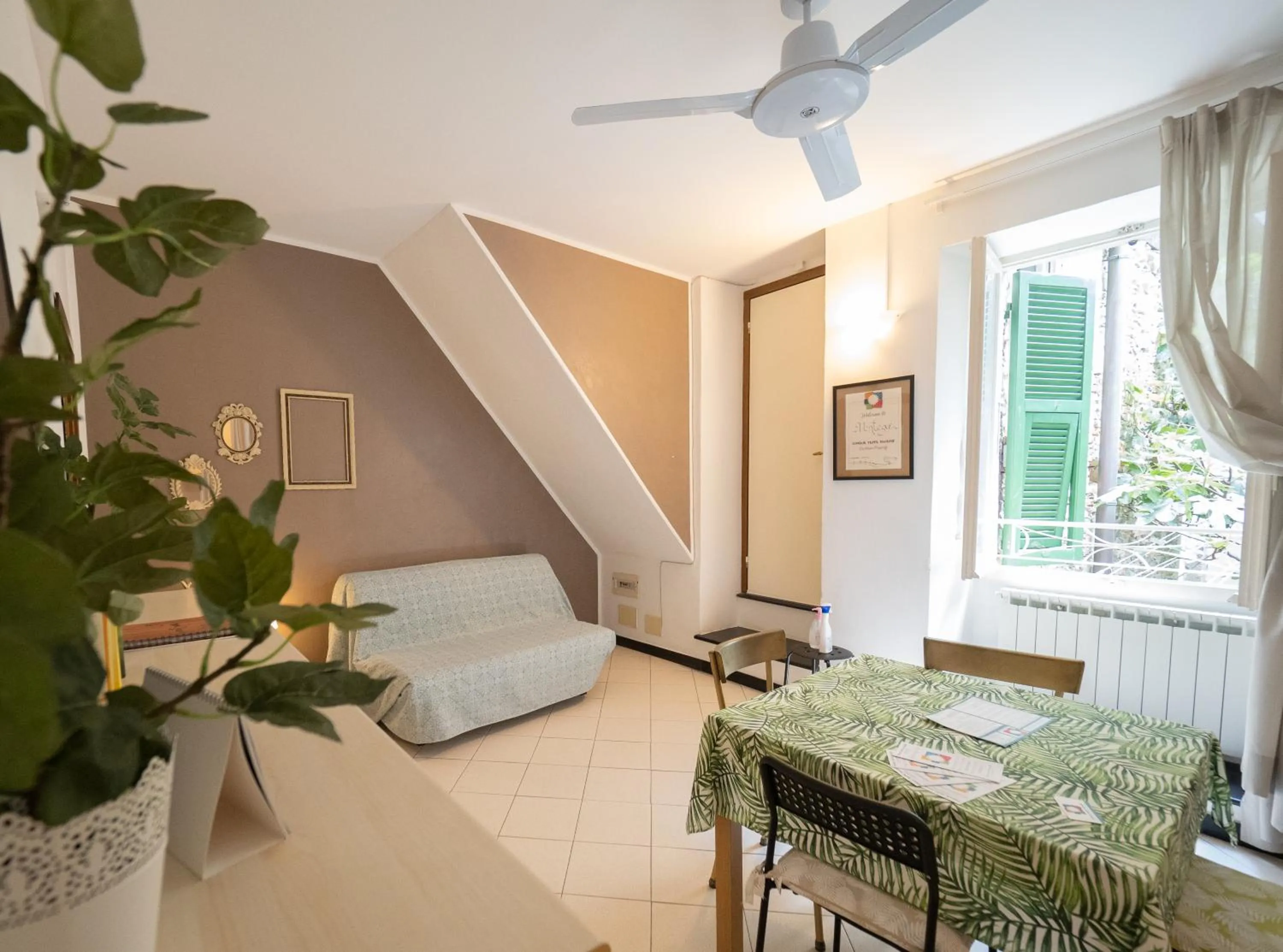 Living room, Bed in Ventegà Sea View Apartment with Balcony