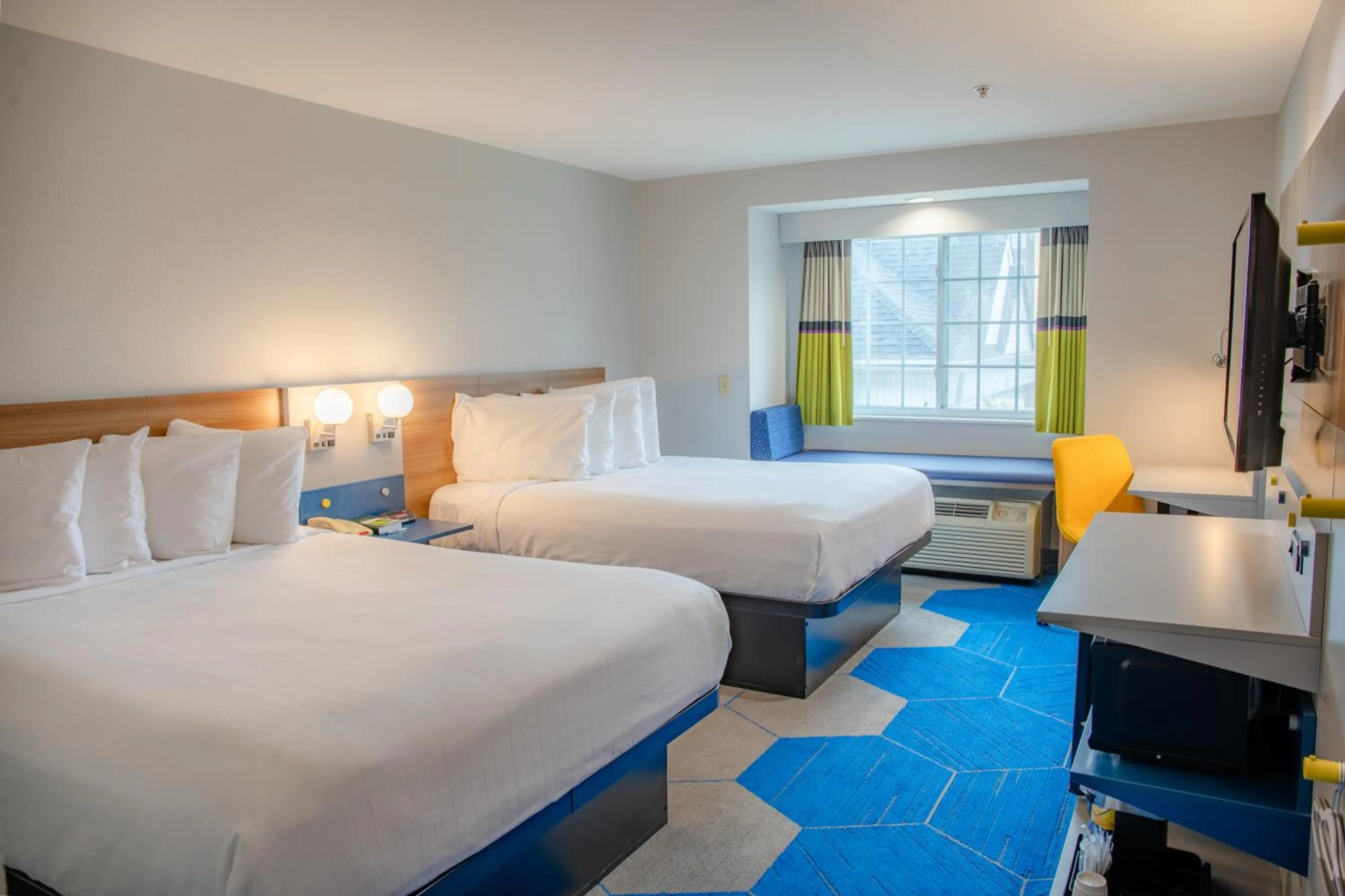 Bed in Microtel Inn & Suites by Wyndham Kingsland Naval Base I-95