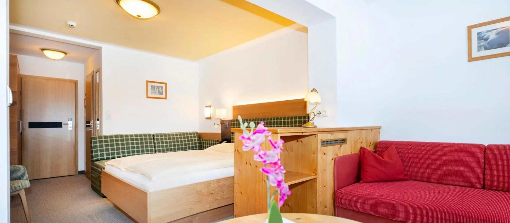 Photo of the whole room, Bed in Landhotel Tirolerhof - Wildschönau - PREMIUM Card im Sommer