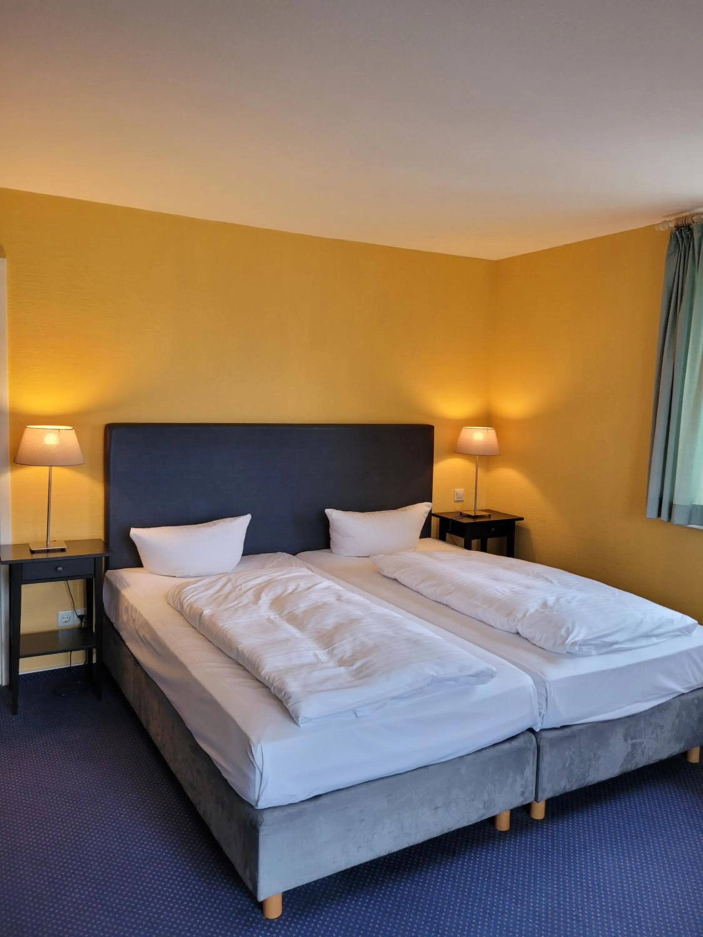 Photo of the whole room, Bed in NP Hotel Schweriner Hof