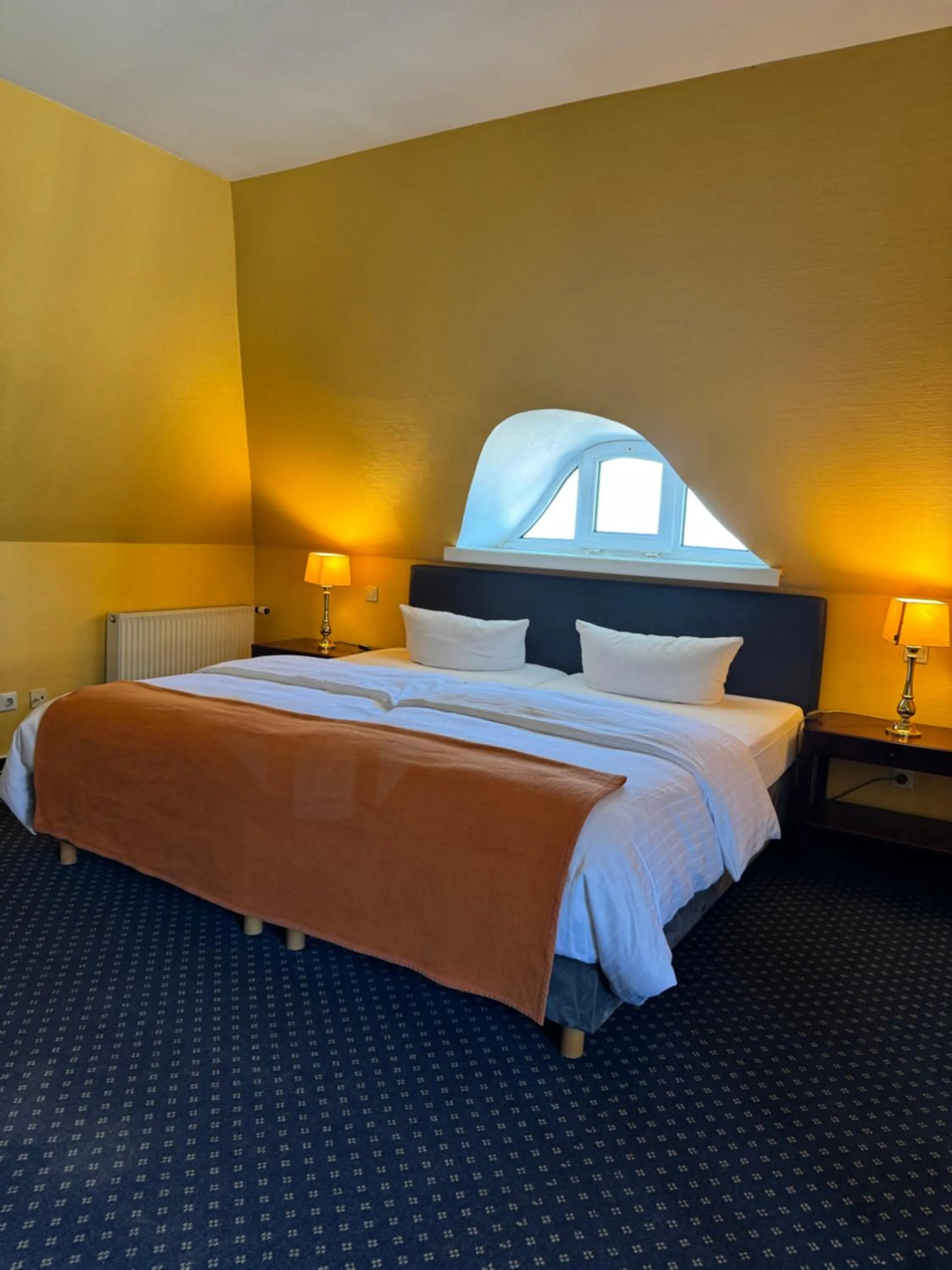 Bed in Hotel Schweriner Hof