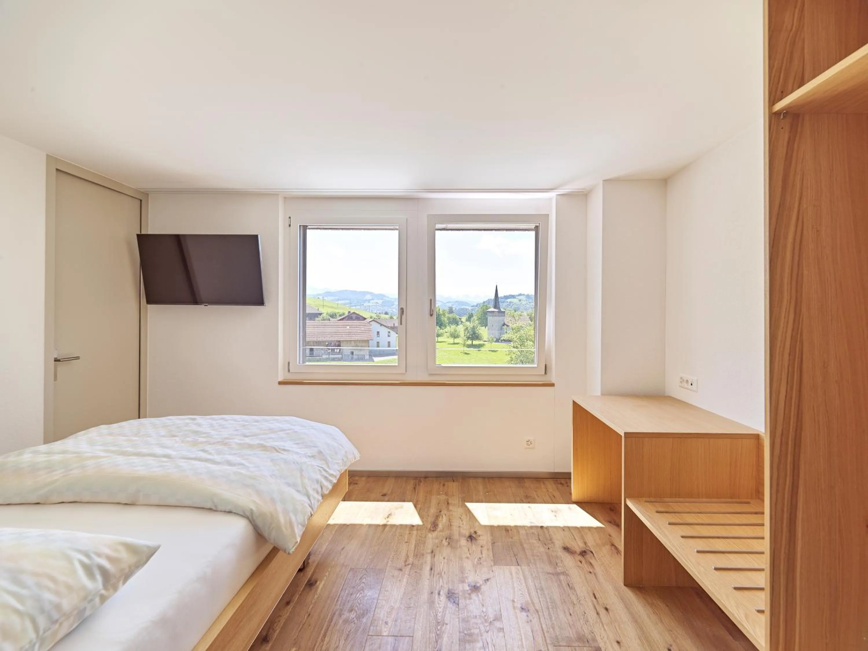 Bed in Hotel Rössli Tufertschwil