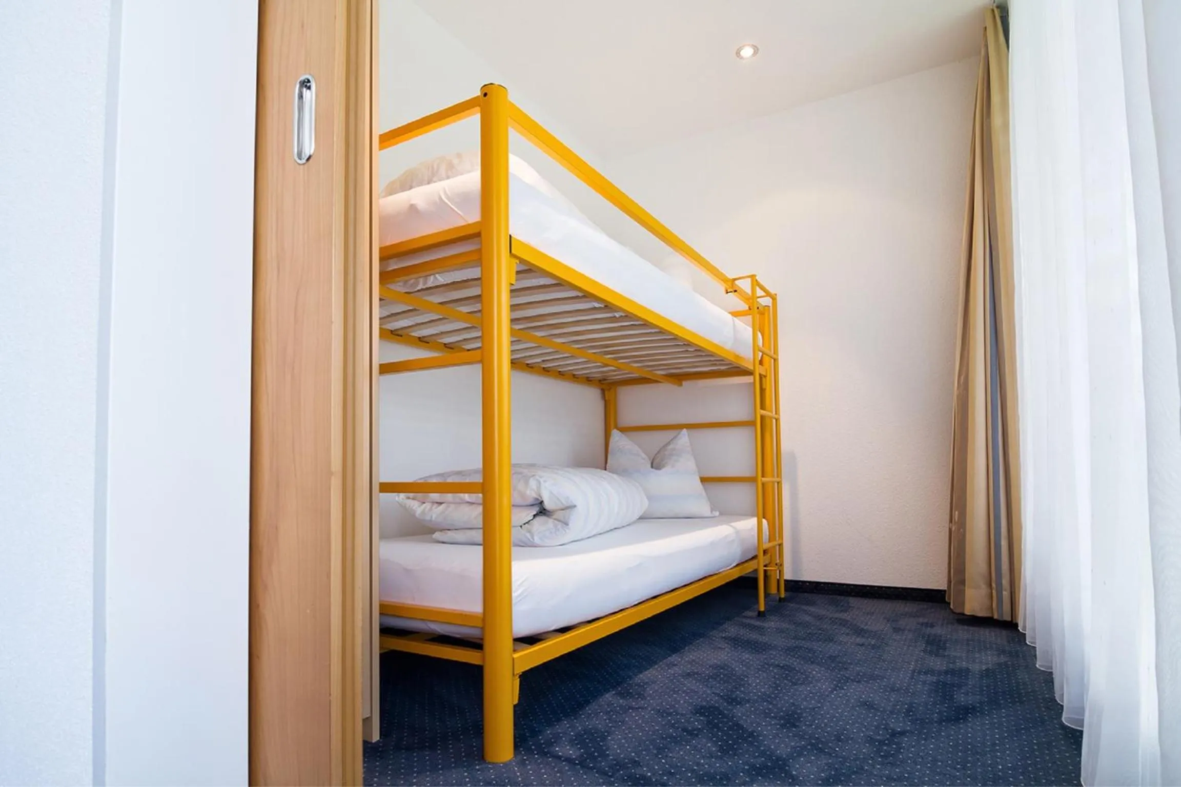 Photo of the whole room, Bed in Hotel Rössli Tufertschwil