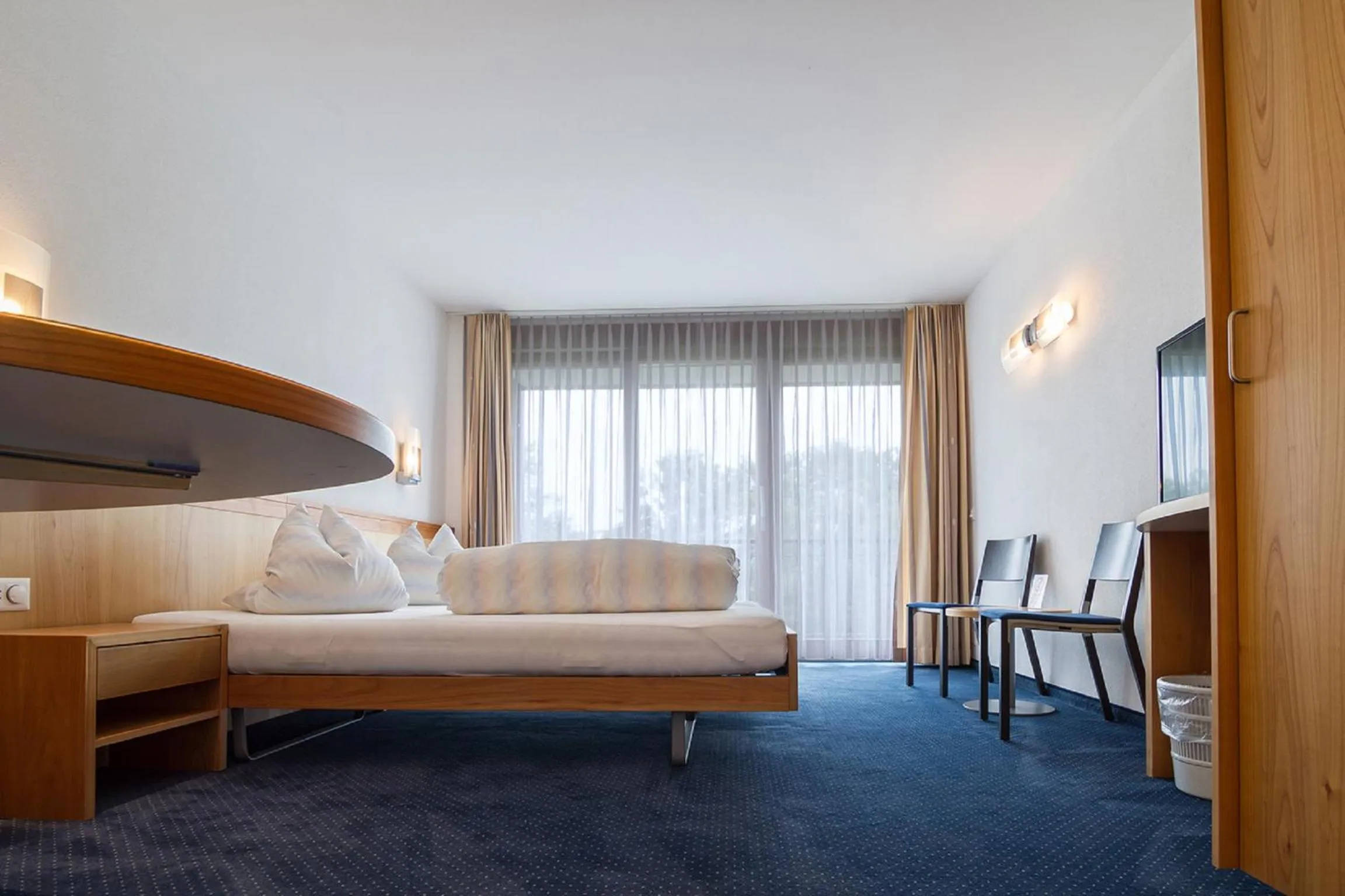 Photo of the whole room, Bed in Hotel Rössli Tufertschwil