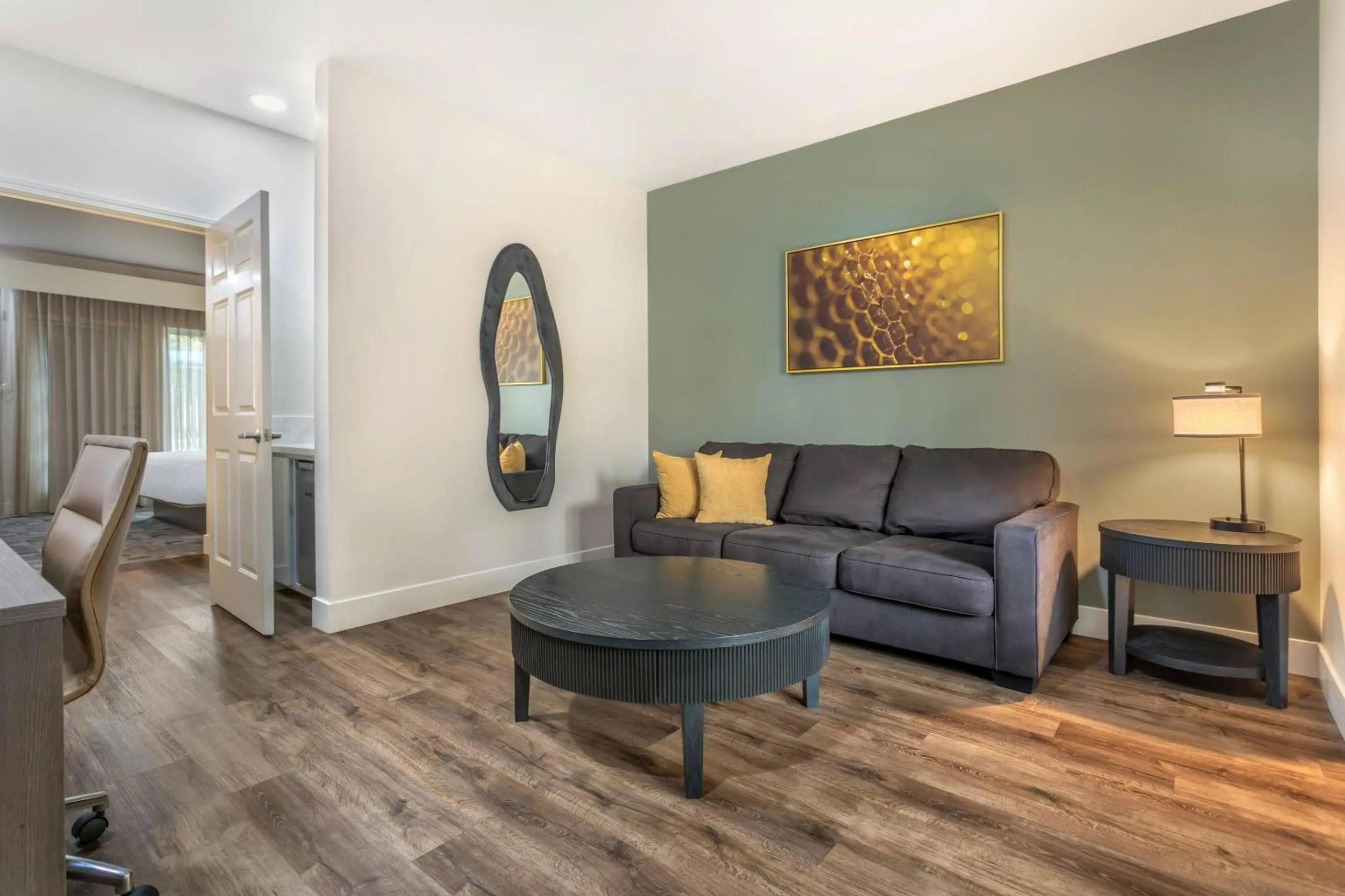 Bedroom in University Park Inn & Suites, an Ascend Collection Hotel