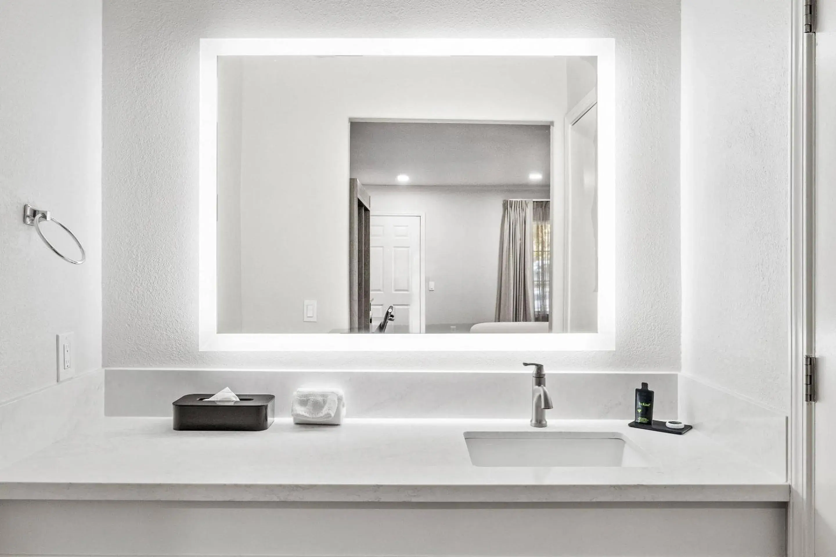 Bedroom in University Park Inn & Suites, an Ascend Collection Hotel Bedroom in University Park Inn & Suites, an Ascend Collection Hotel