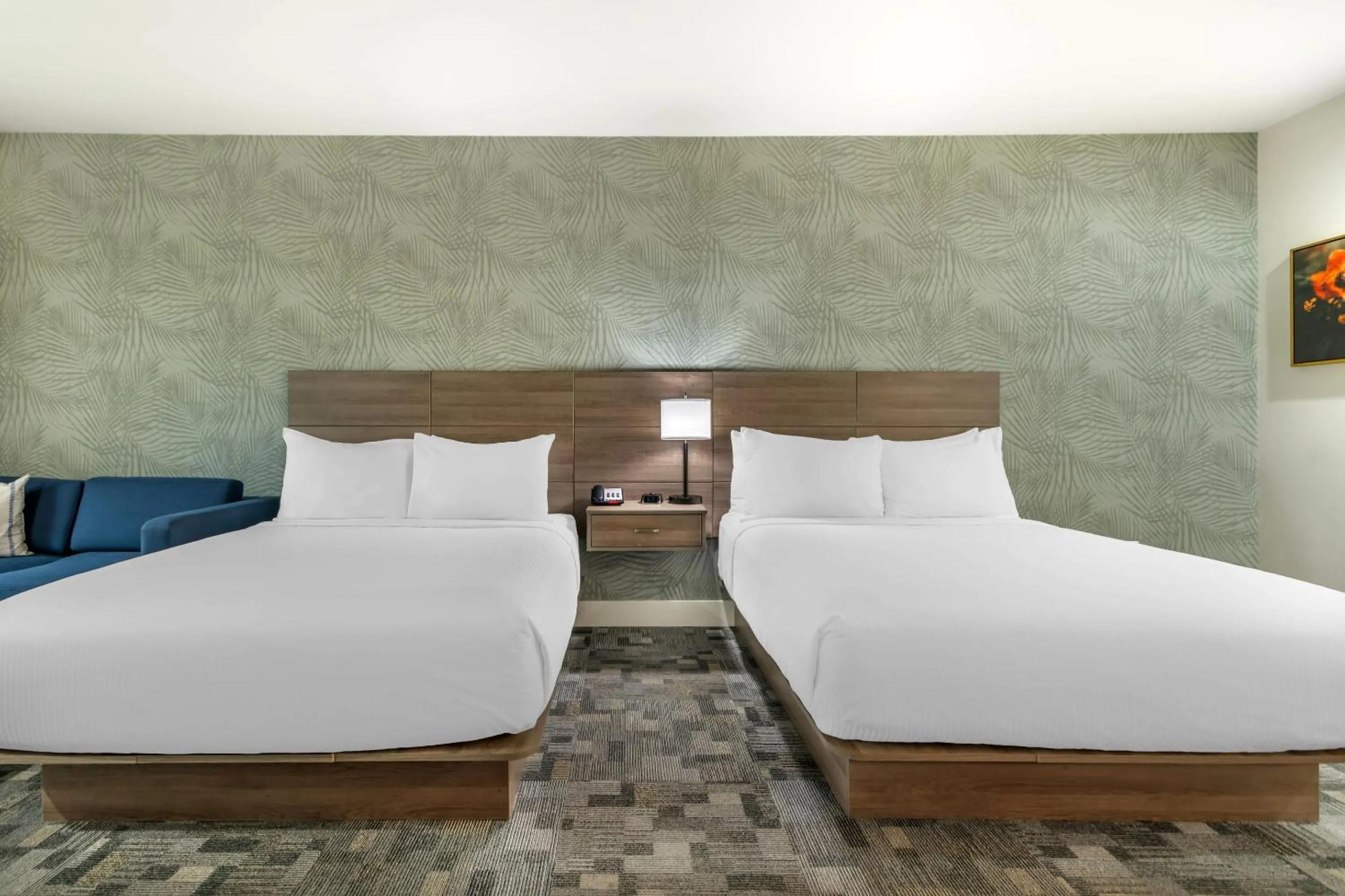 Bedroom, Bed in University Park Inn & Suites, an Ascend Collection Hotel