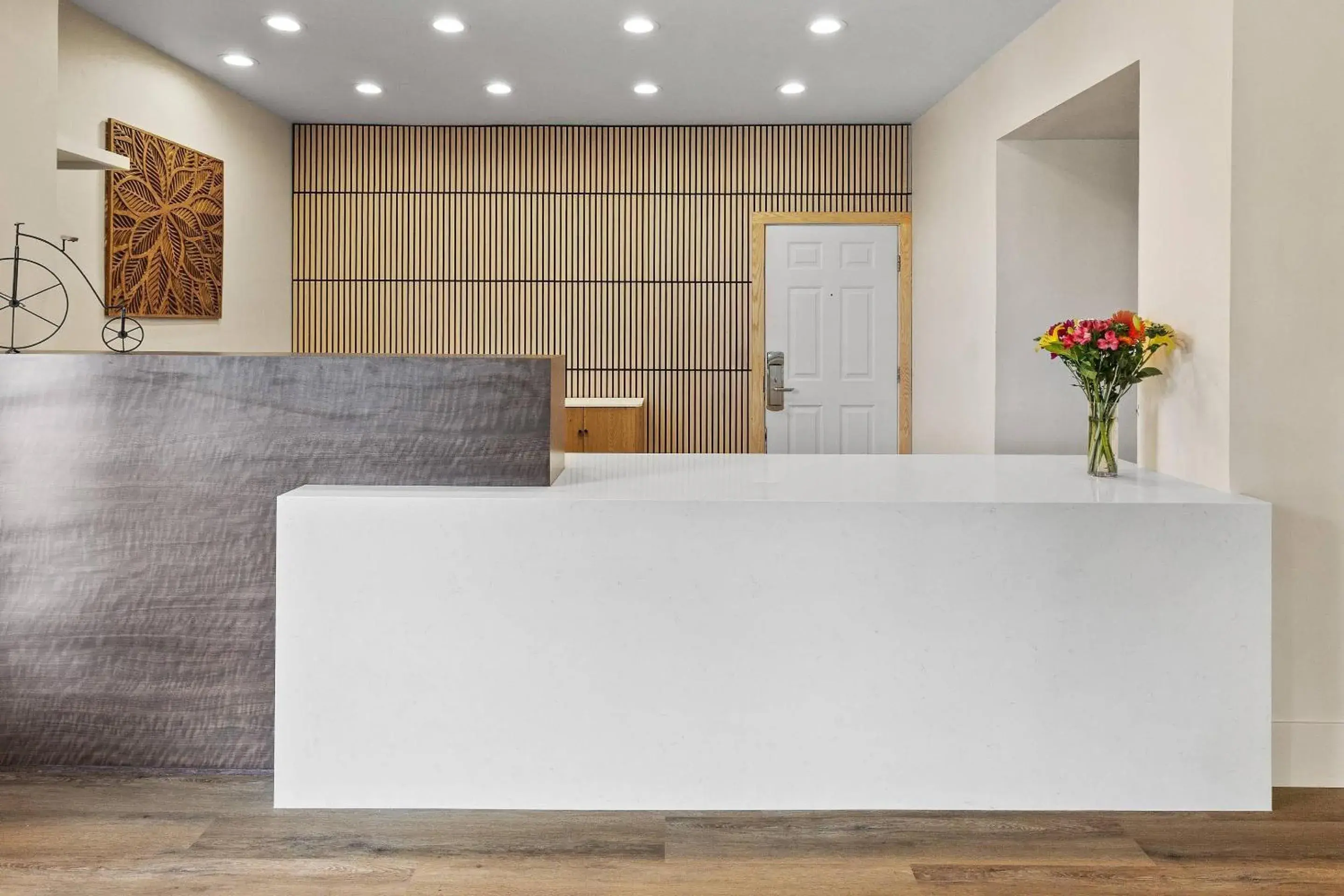 Lobby or reception in University Park Inn & Suites, an Ascend Collection Hotel Lobby or reception in University Park Inn & Suites, an Ascend Collection Hotel