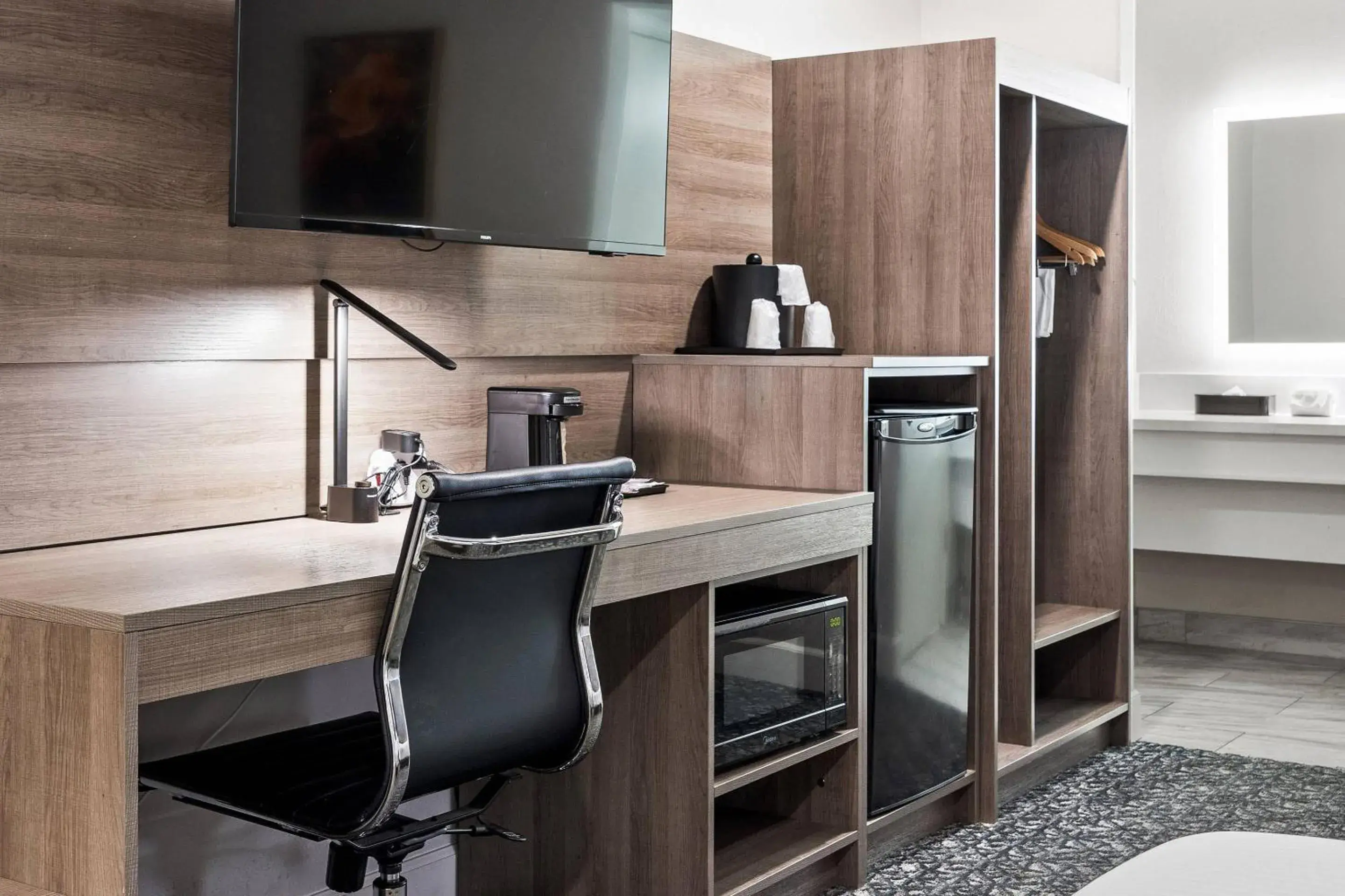 Bedroom in University Park Inn & Suites, an Ascend Collection Hotel Bedroom in University Park Inn & Suites, an Ascend Collection Hotel