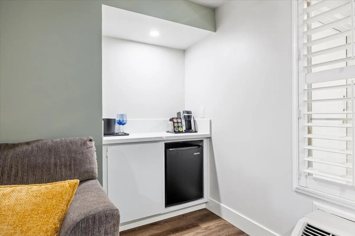 Living room in University Park Inn & Suites, an Ascend Collection Hotel