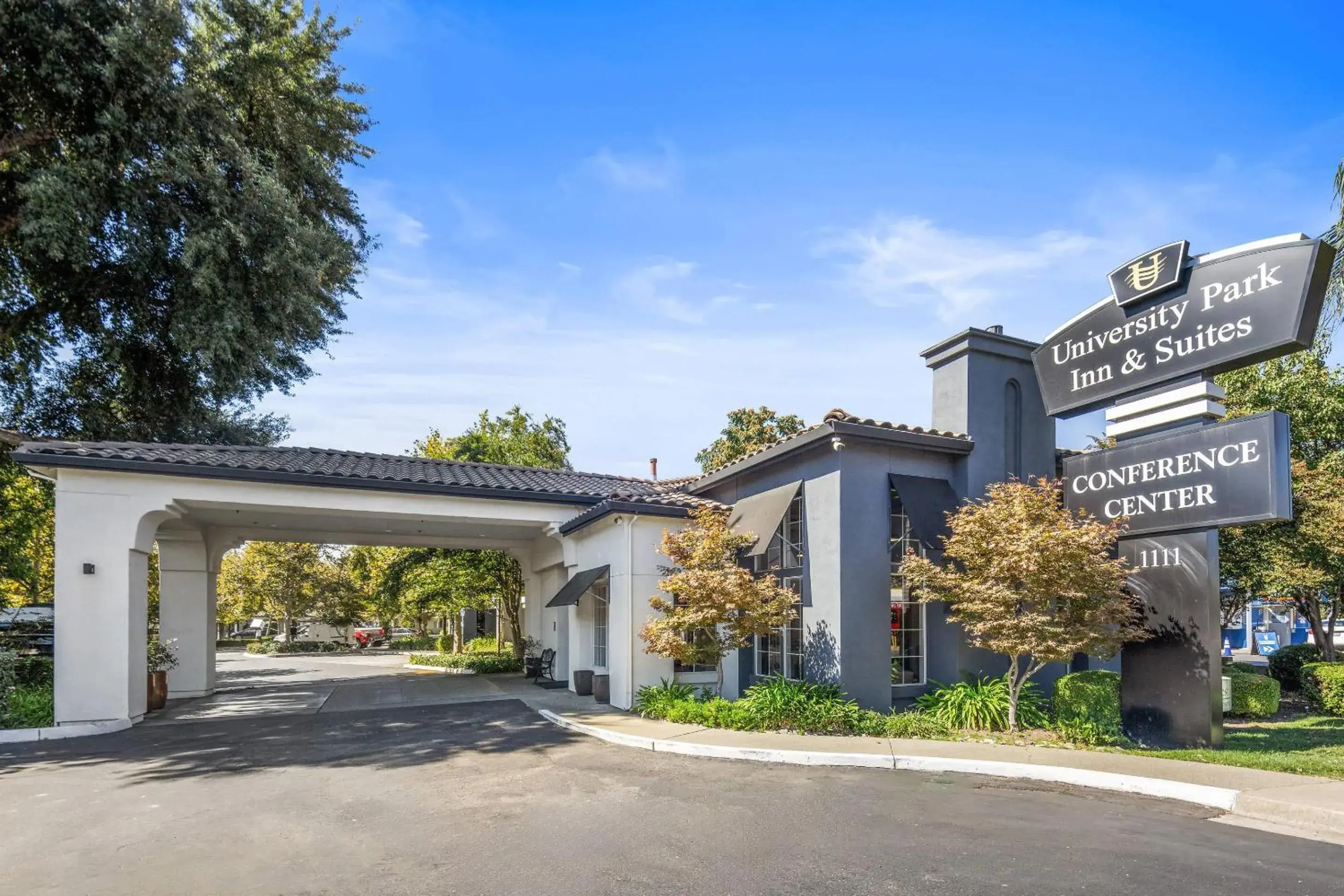Property building in University Park Inn & Suites, an Ascend Collection Hotel Property building in University Park Inn & Suites, an Ascend Collection Hotel
