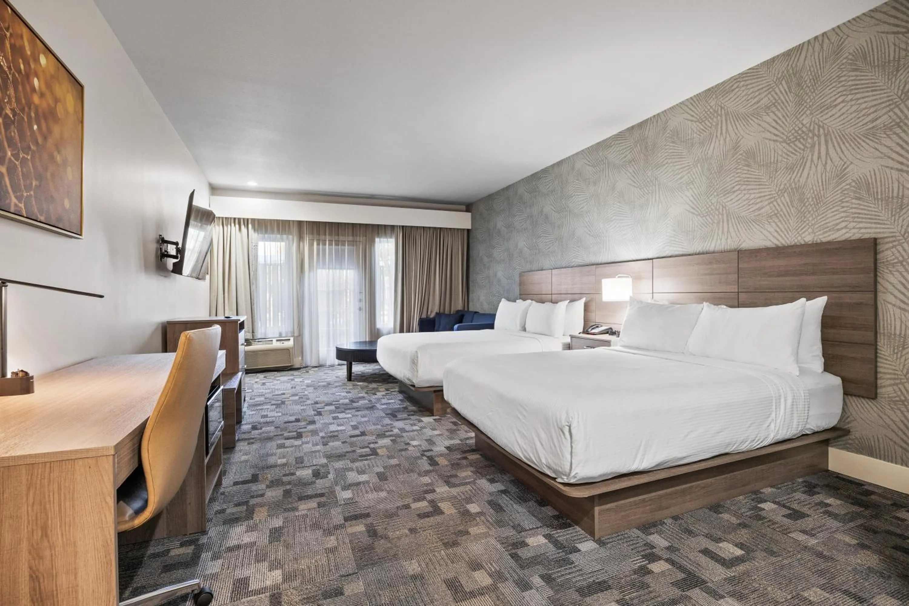 Bedroom, Bed in University Park Inn & Suites, an Ascend Collection Hotel