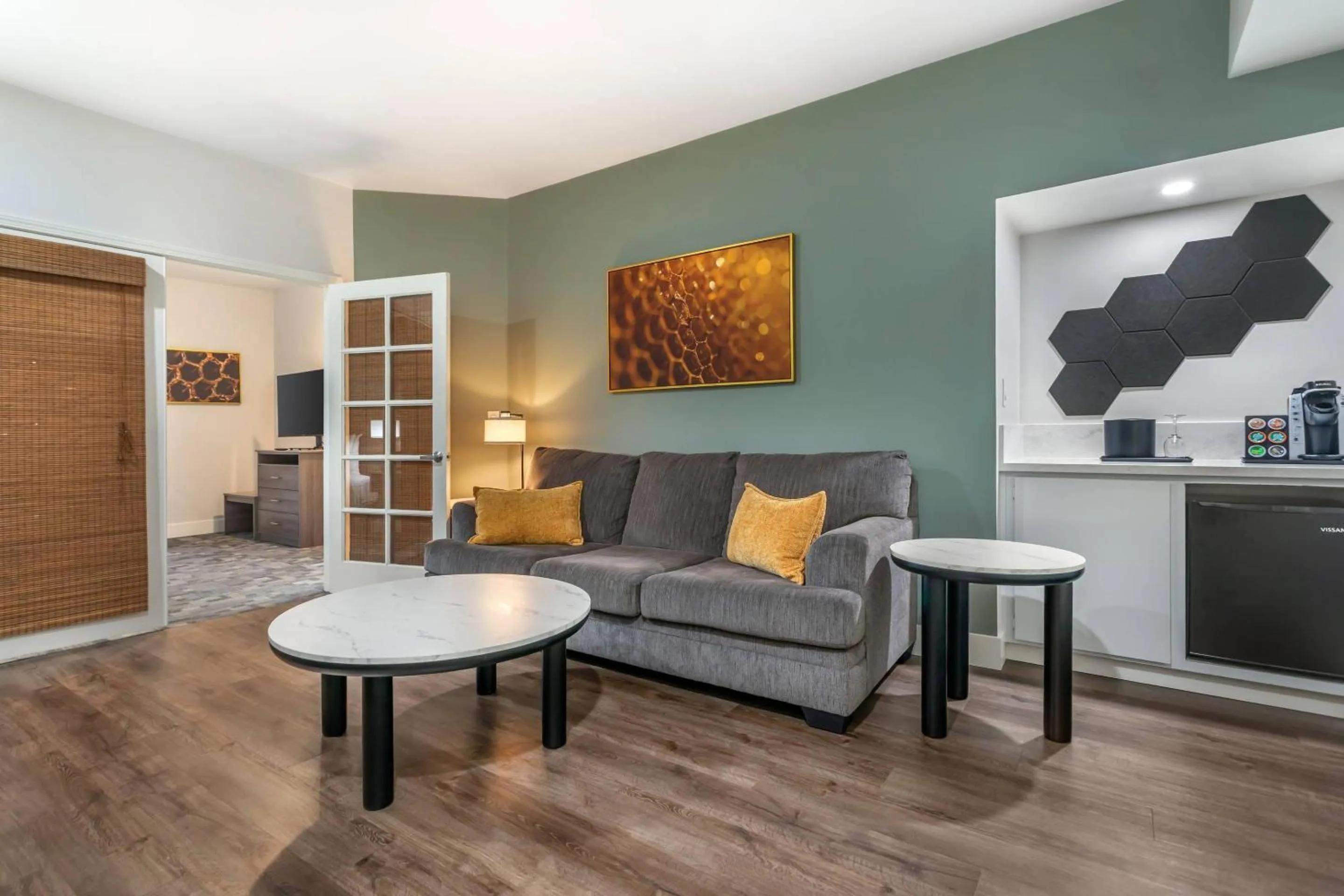 Bedroom in University Park Inn & Suites, an Ascend Collection Hotel