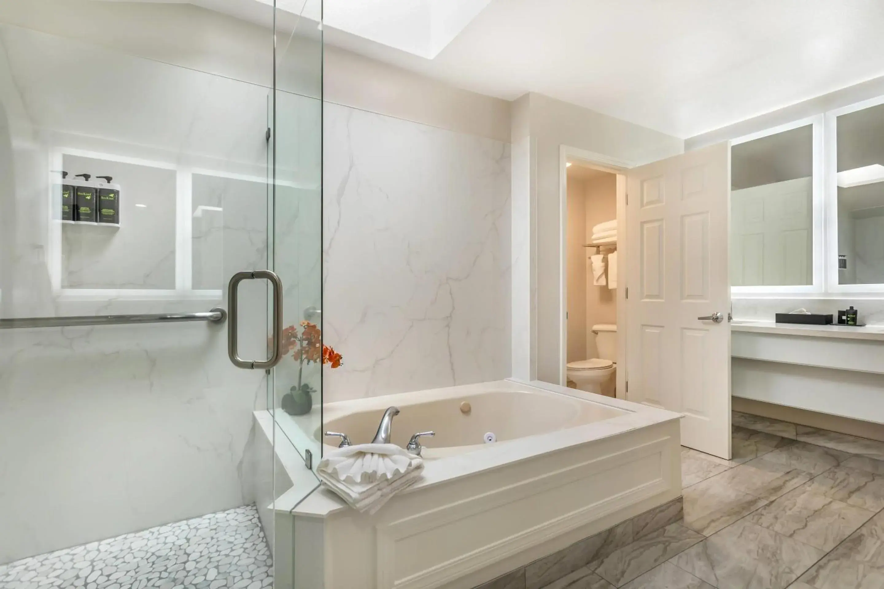 Bedroom in University Park Inn & Suites, an Ascend Collection Hotel Bedroom in University Park Inn & Suites, an Ascend Collection Hotel