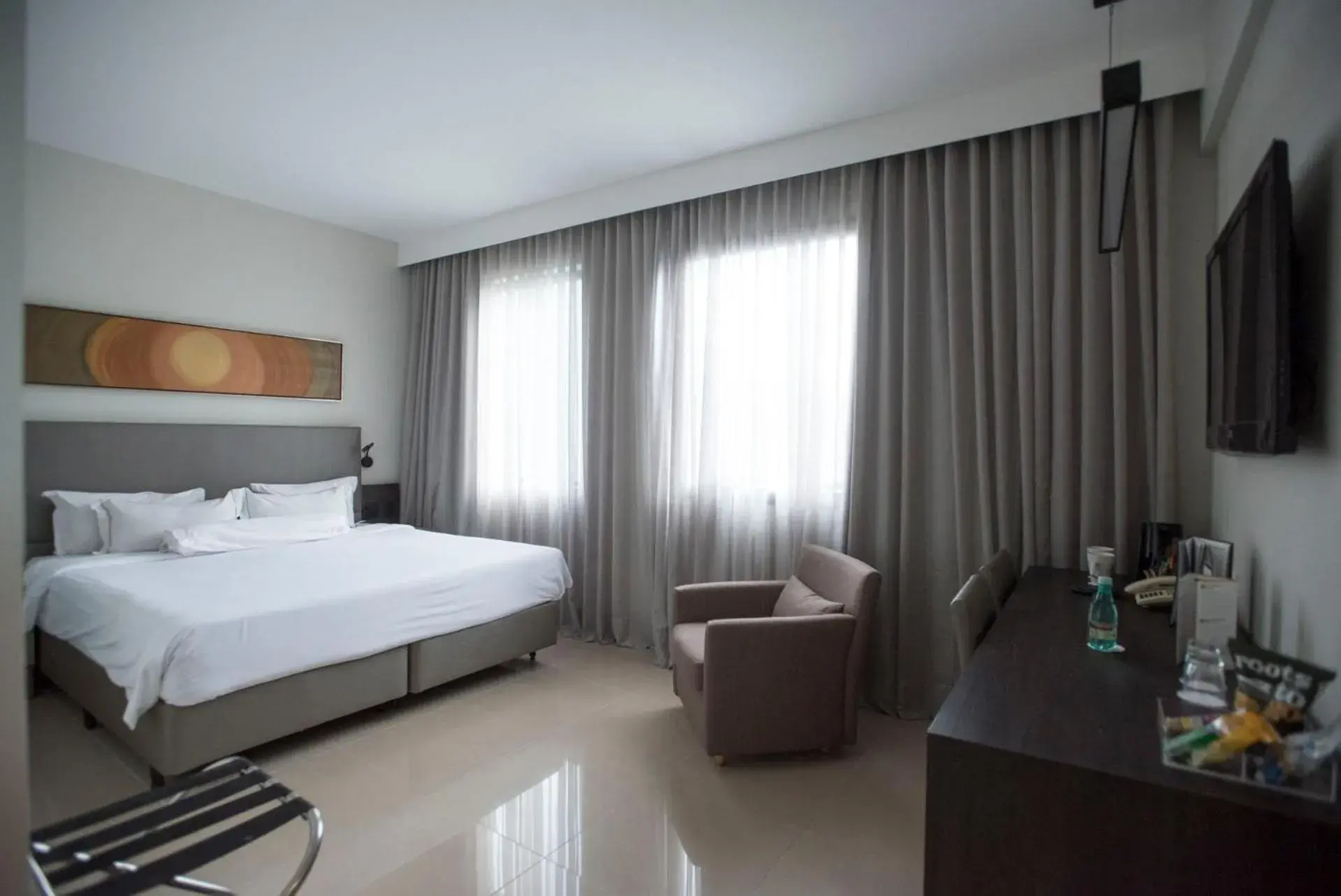 Photo of the whole room, Bed in Royal Collection Savassi Photo of the whole room, Bed in Royal Collection Savassi