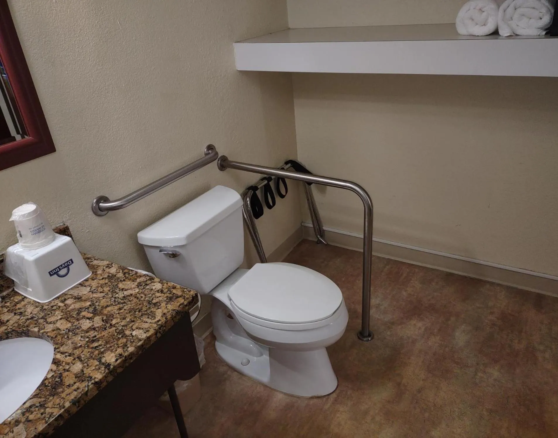Toilet in Days Inn by Wyndham Port Charlotte Town Center