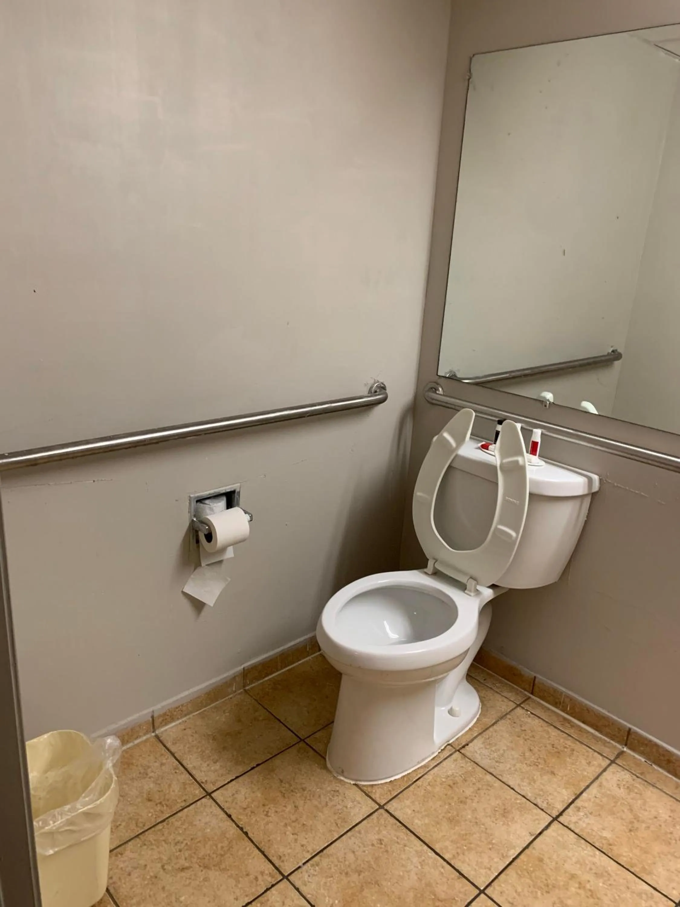 Toilet in Days Inn by Wyndham Louisville Airport Fair and Expo Center