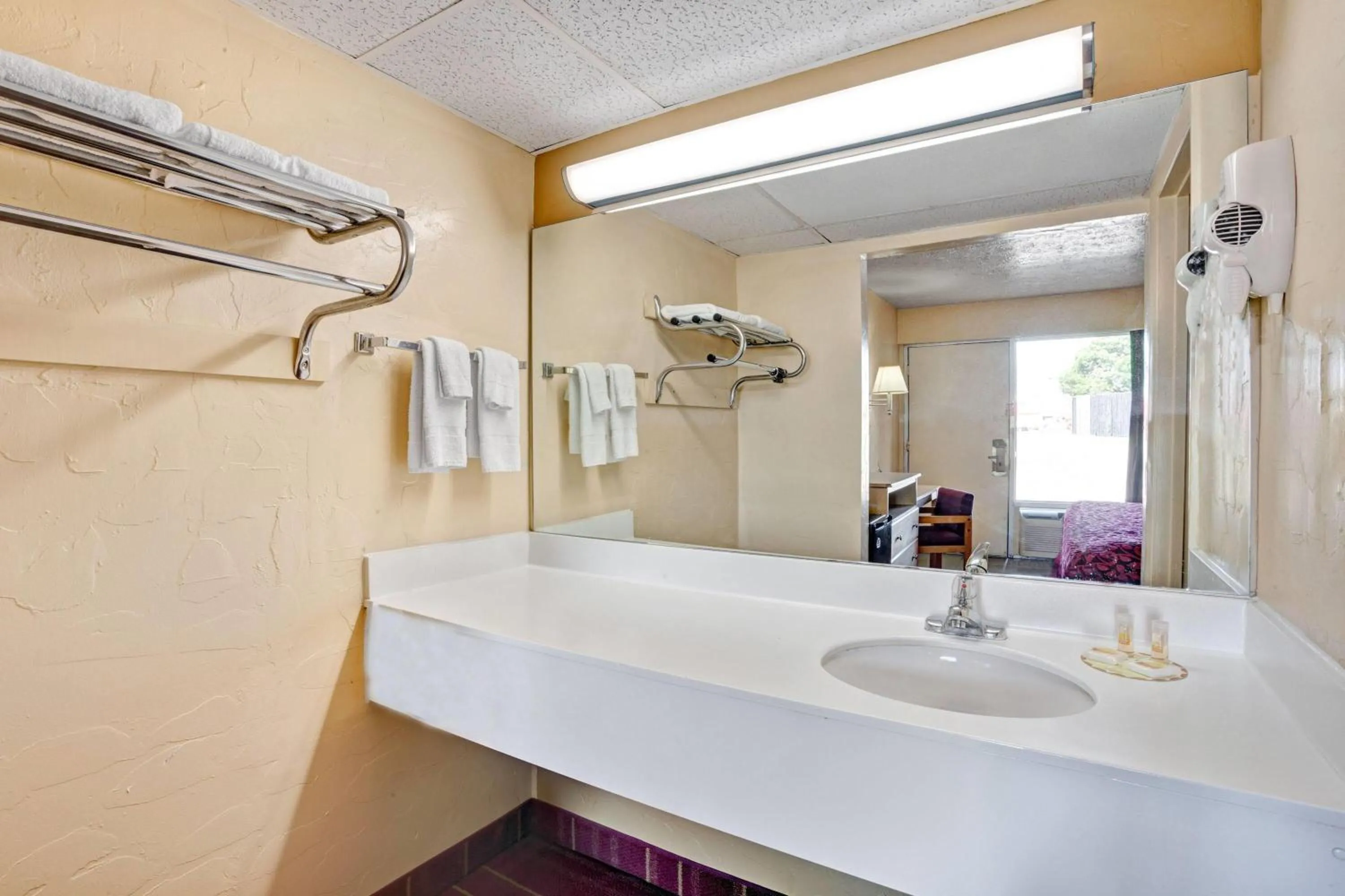 Bathroom in Days Inn by Wyndham Louisville Airport Fair and Expo Center