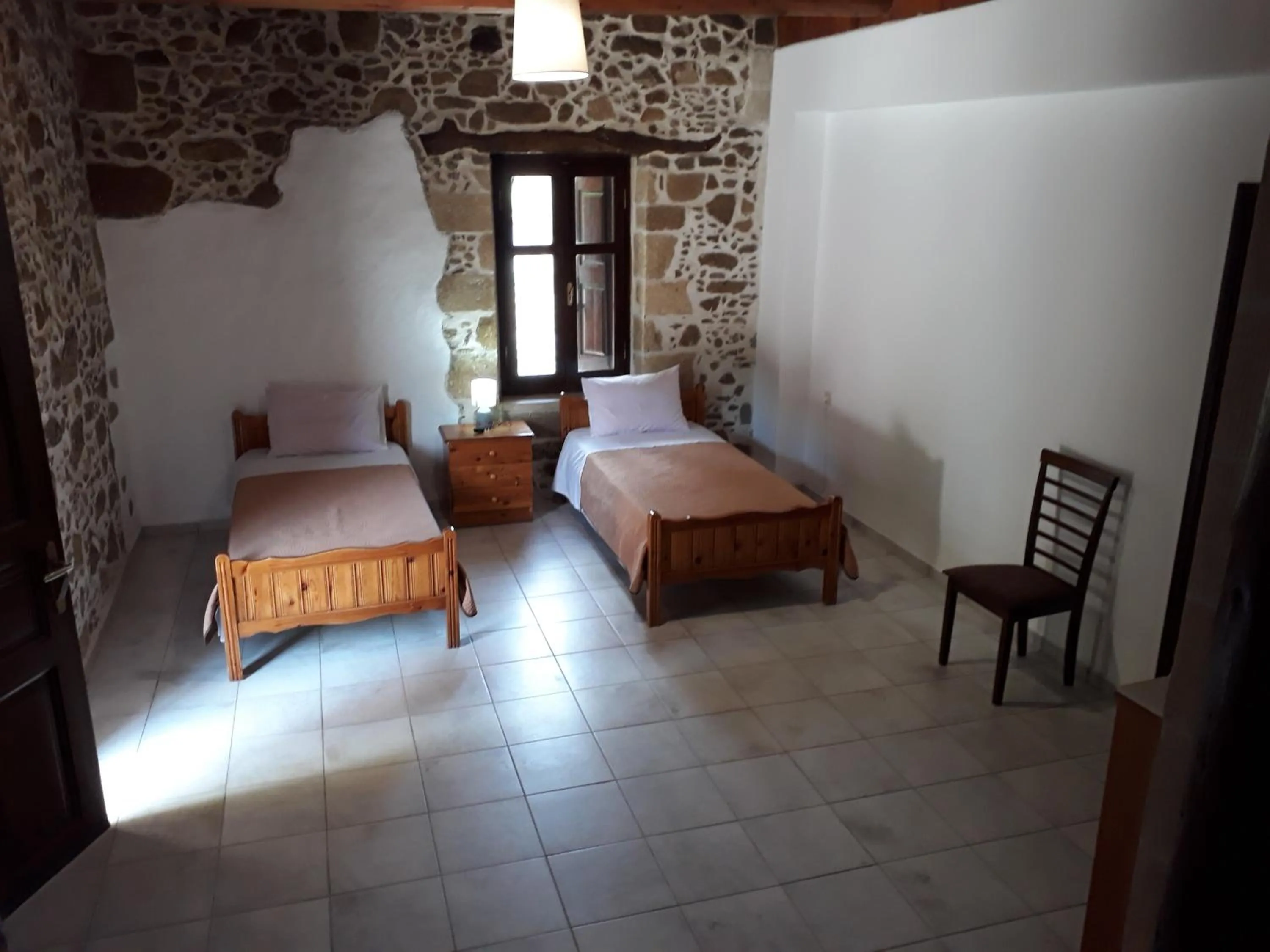 Bed in Traditional House Koukounara
