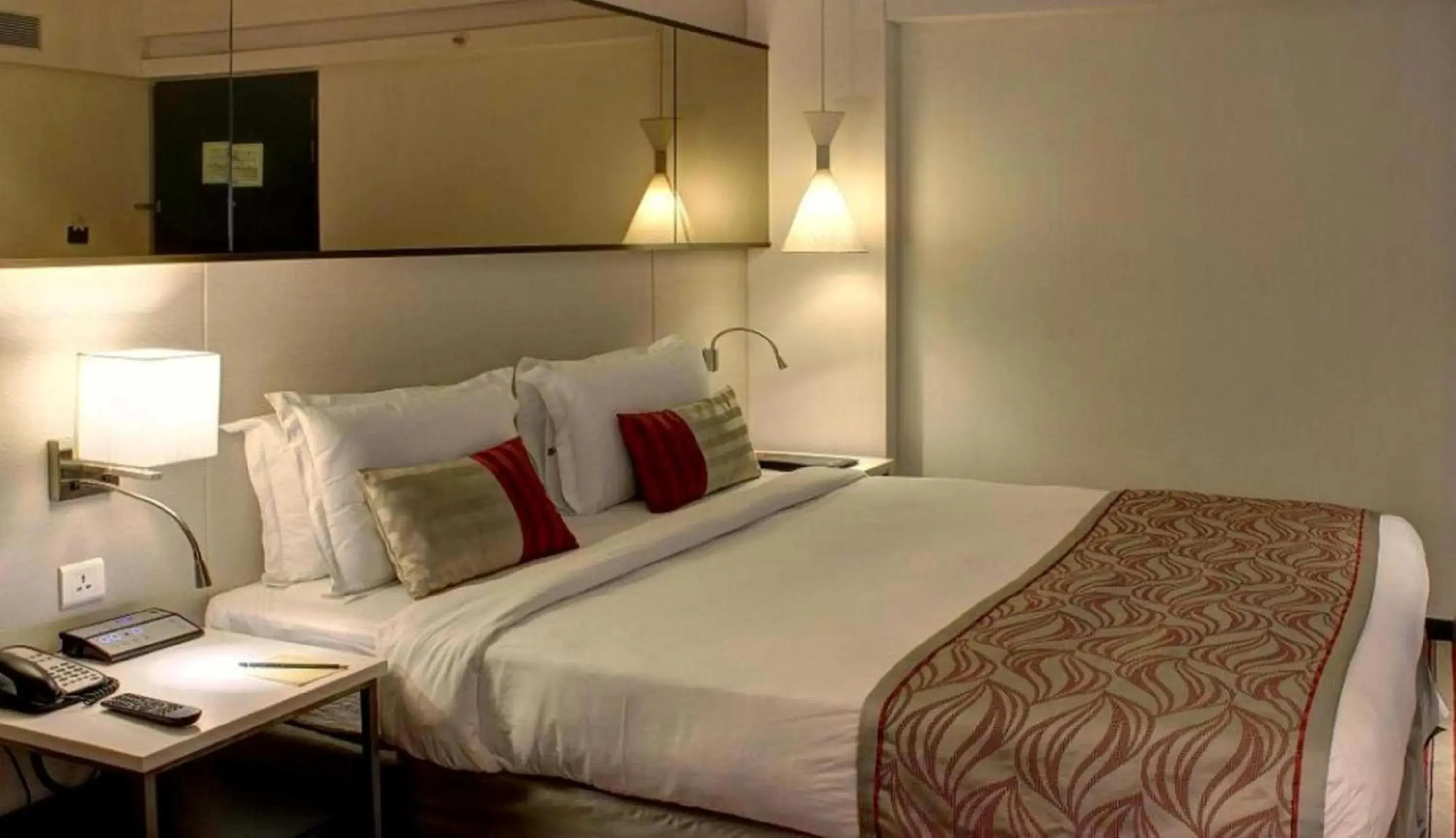 Bed in The Sahil Hotel Bed in The Sahil Hotel