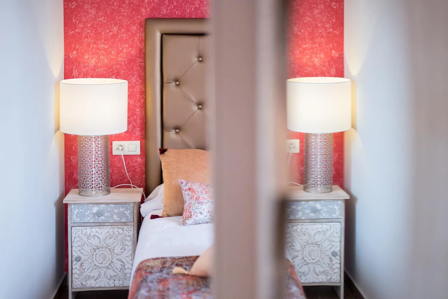 Bed in Alhambra Boutique Apartments by PMC Resorts