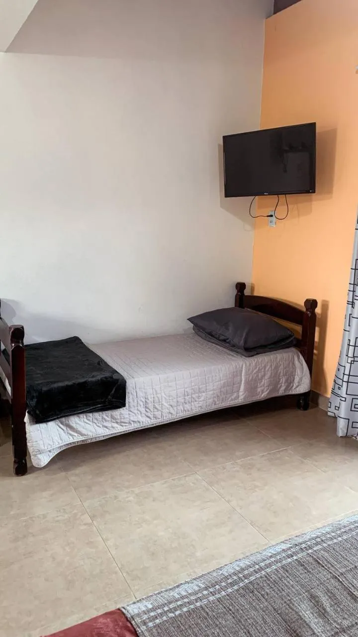 Bed in Pousada Rosa Negra