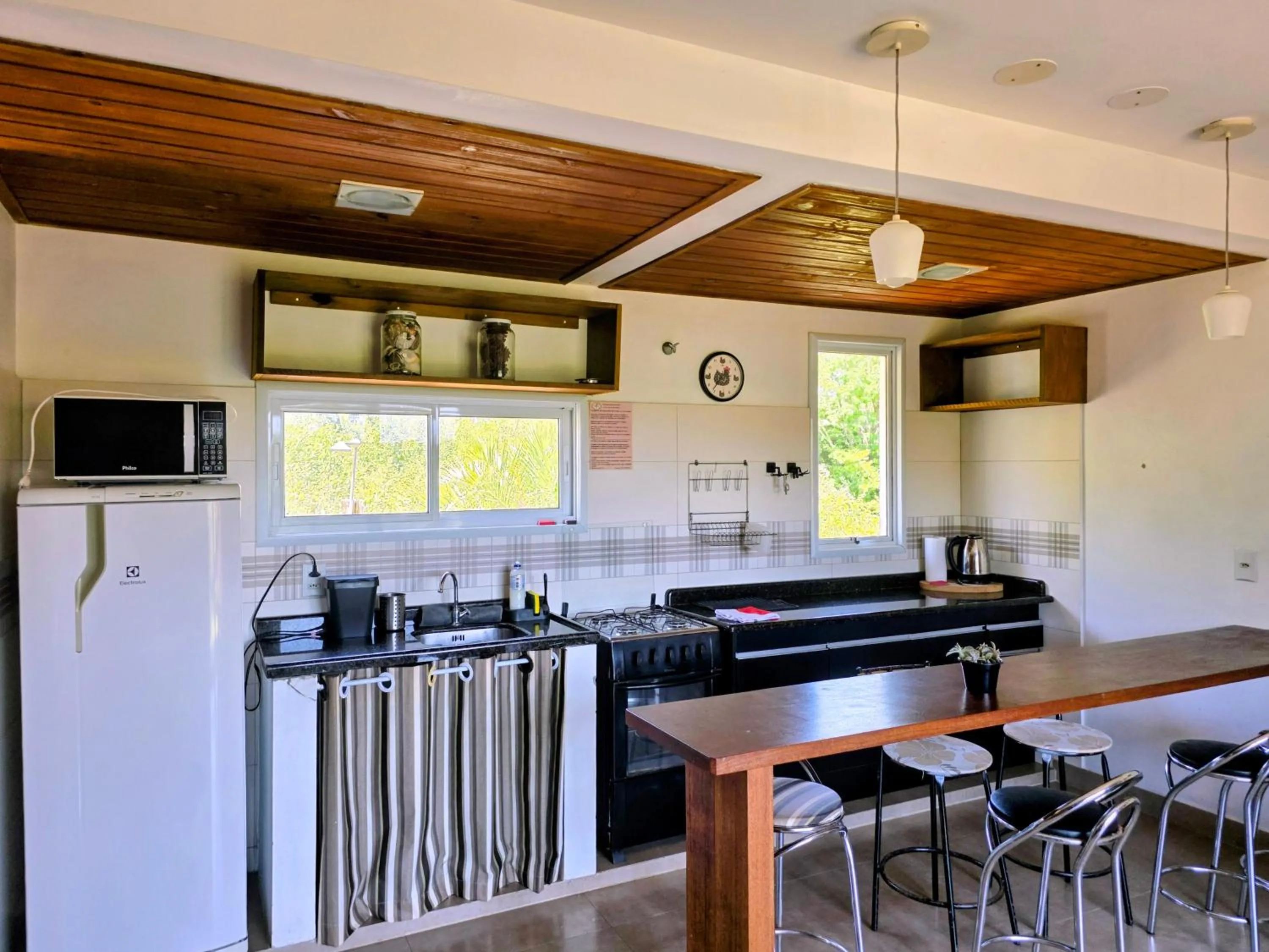 Kitchen or kitchenette in Pousada Rosa Negra