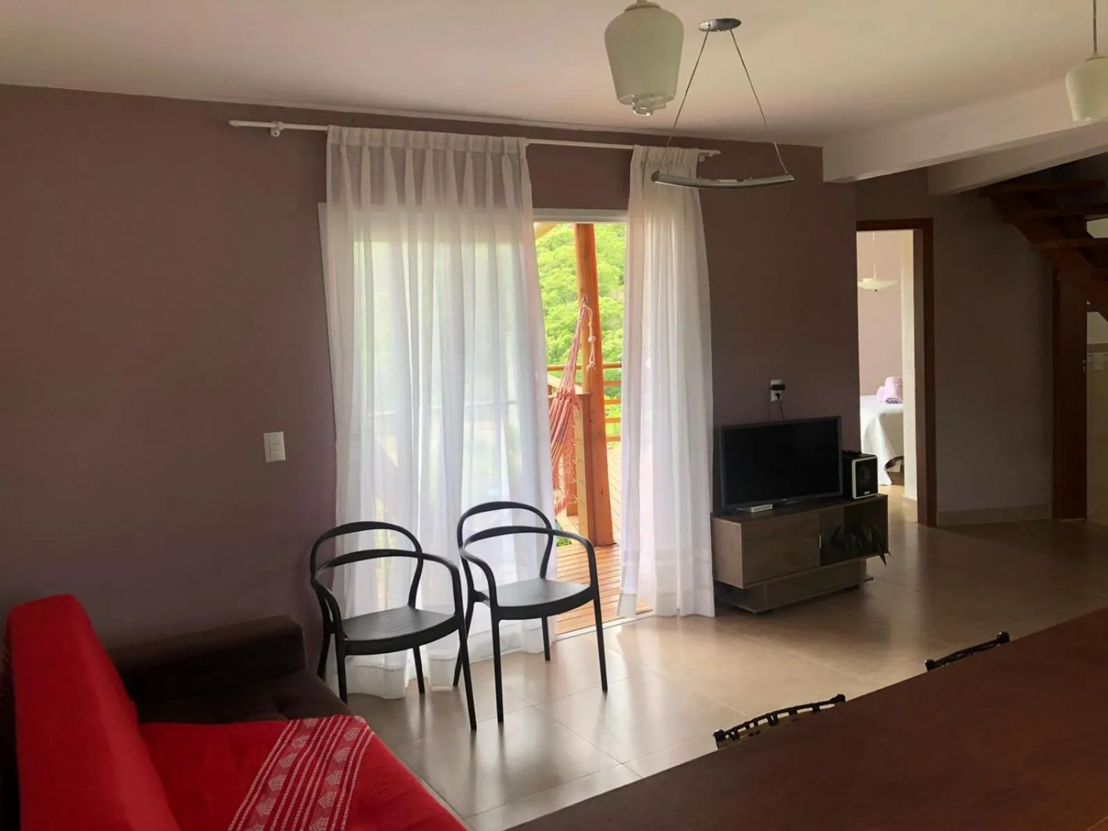 Communal lounge/ TV room in Pousada Rosa Negra