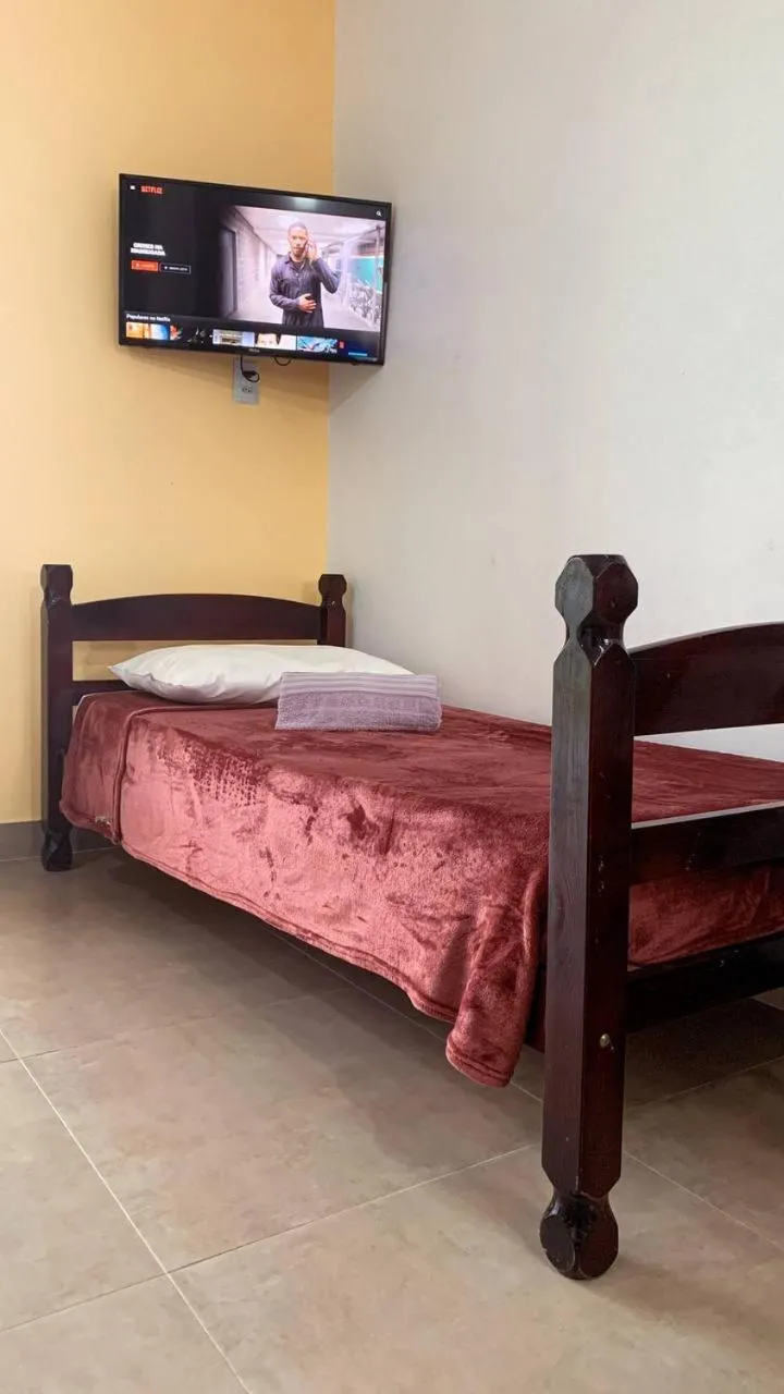Bed in Pousada Rosa Negra