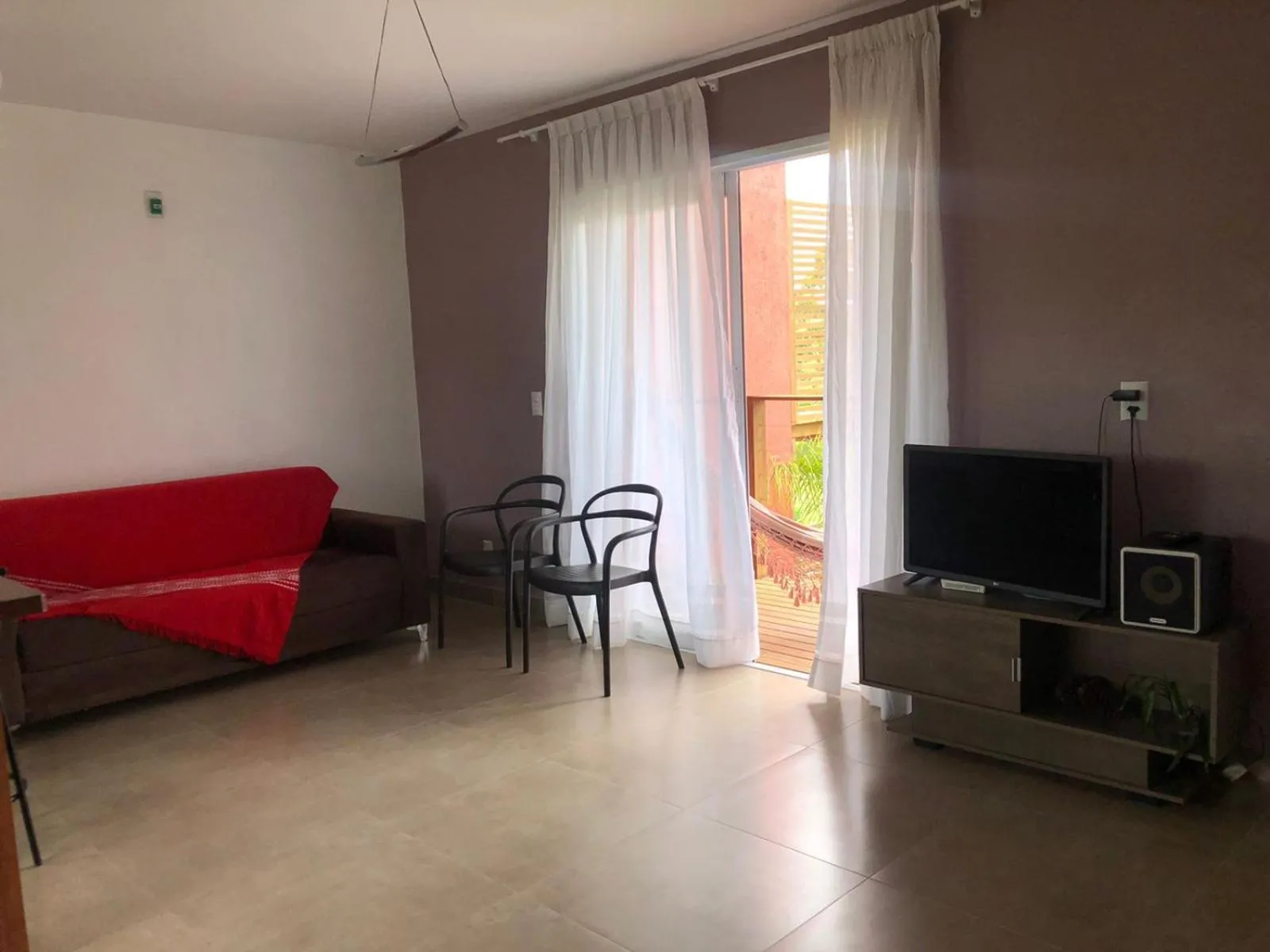 Communal lounge/ TV room in Pousada Rosa Negra