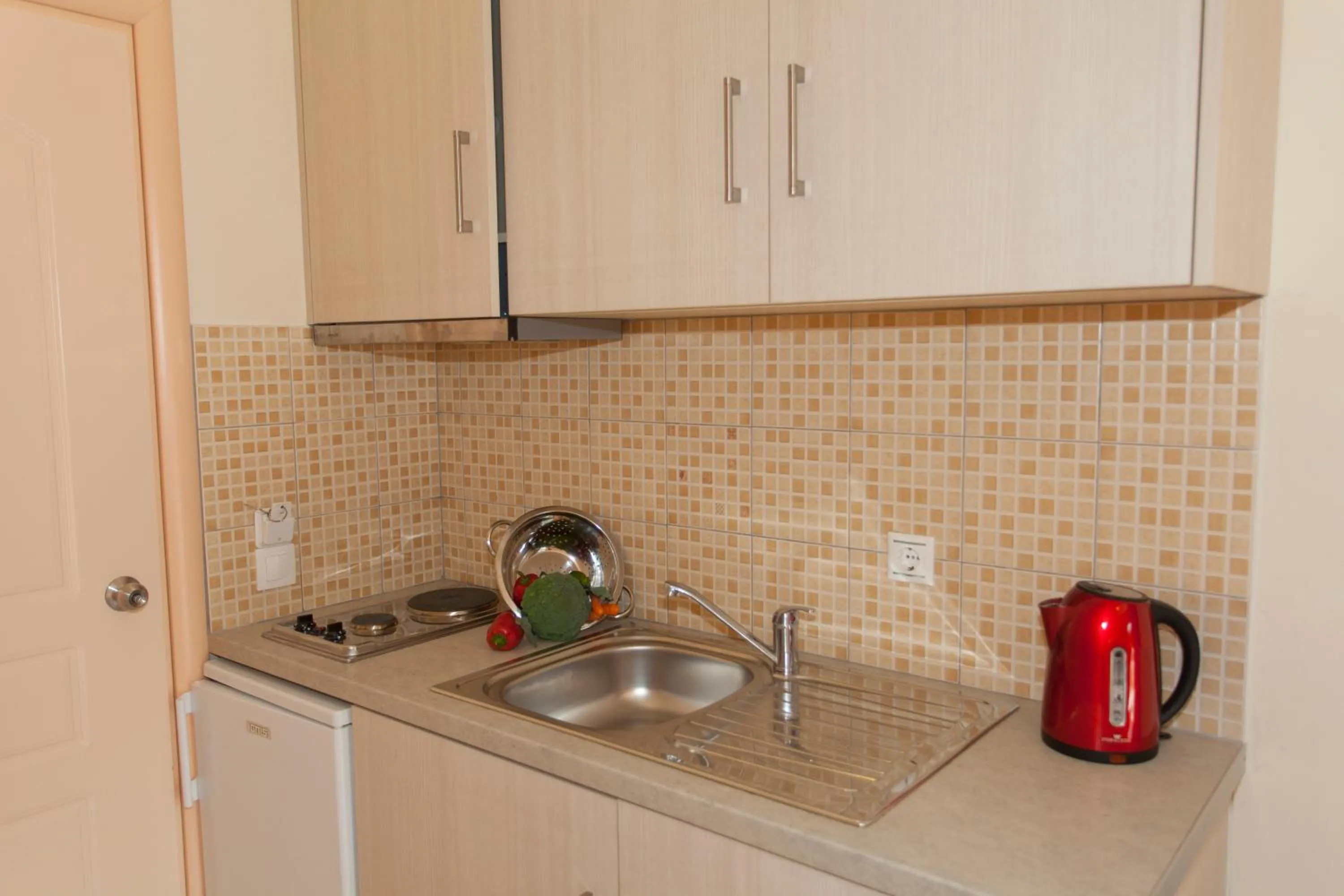 Kitchen or kitchenette in Hotel Loukas Vrachos