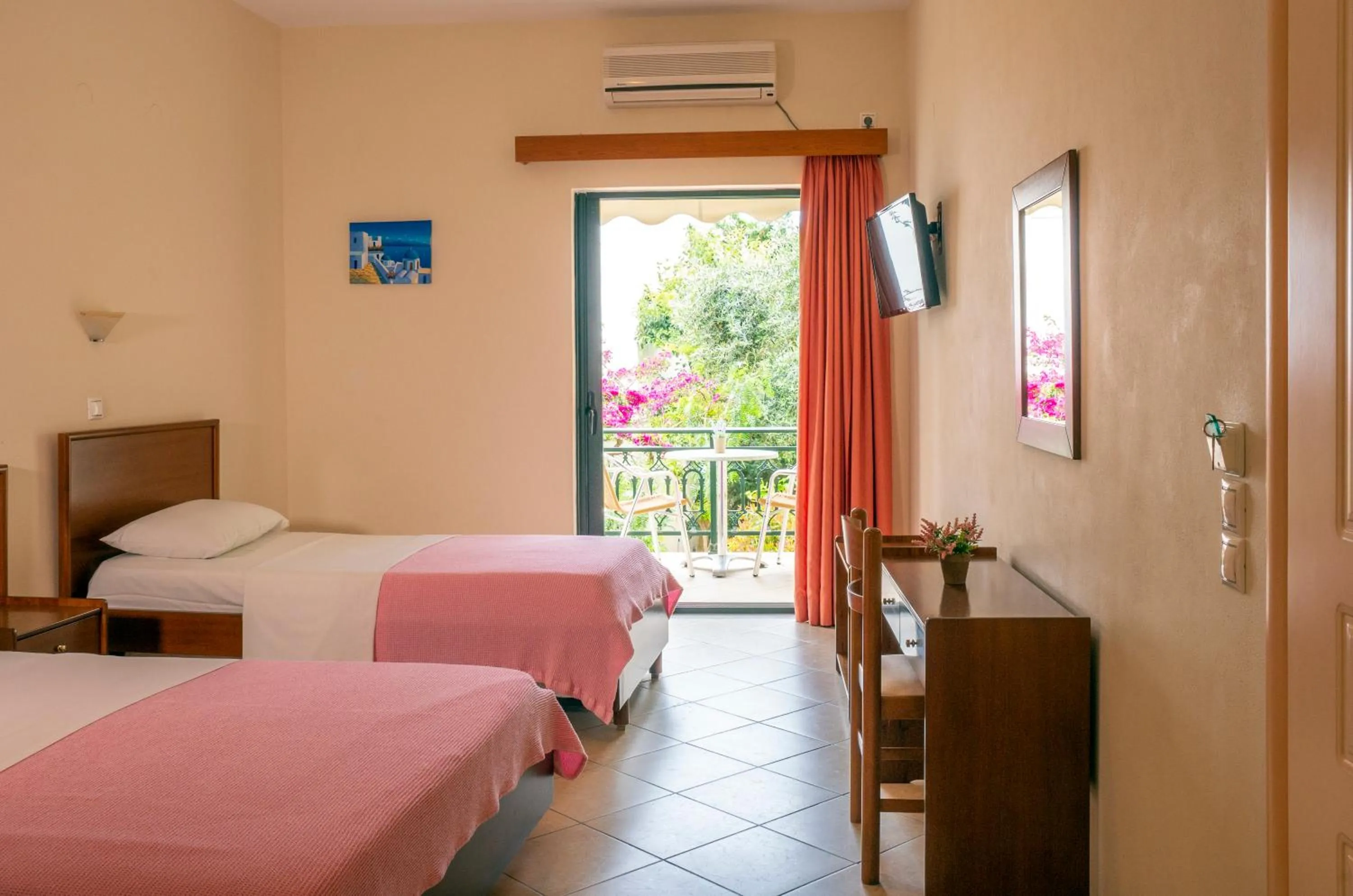 Bed in Hotel Loukas Vrachos