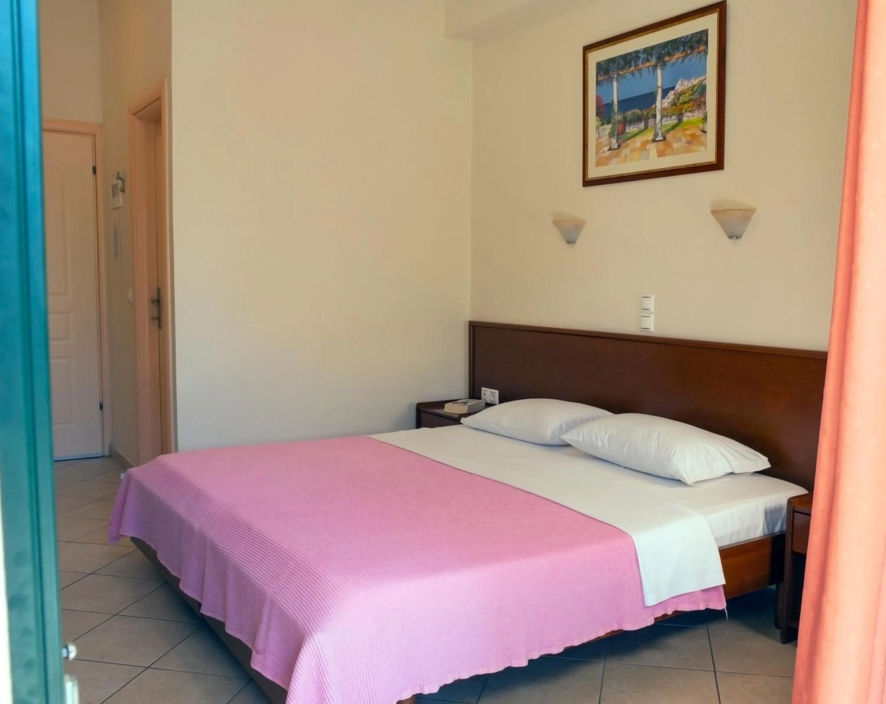 Bed in Hotel Loukas Vrachos