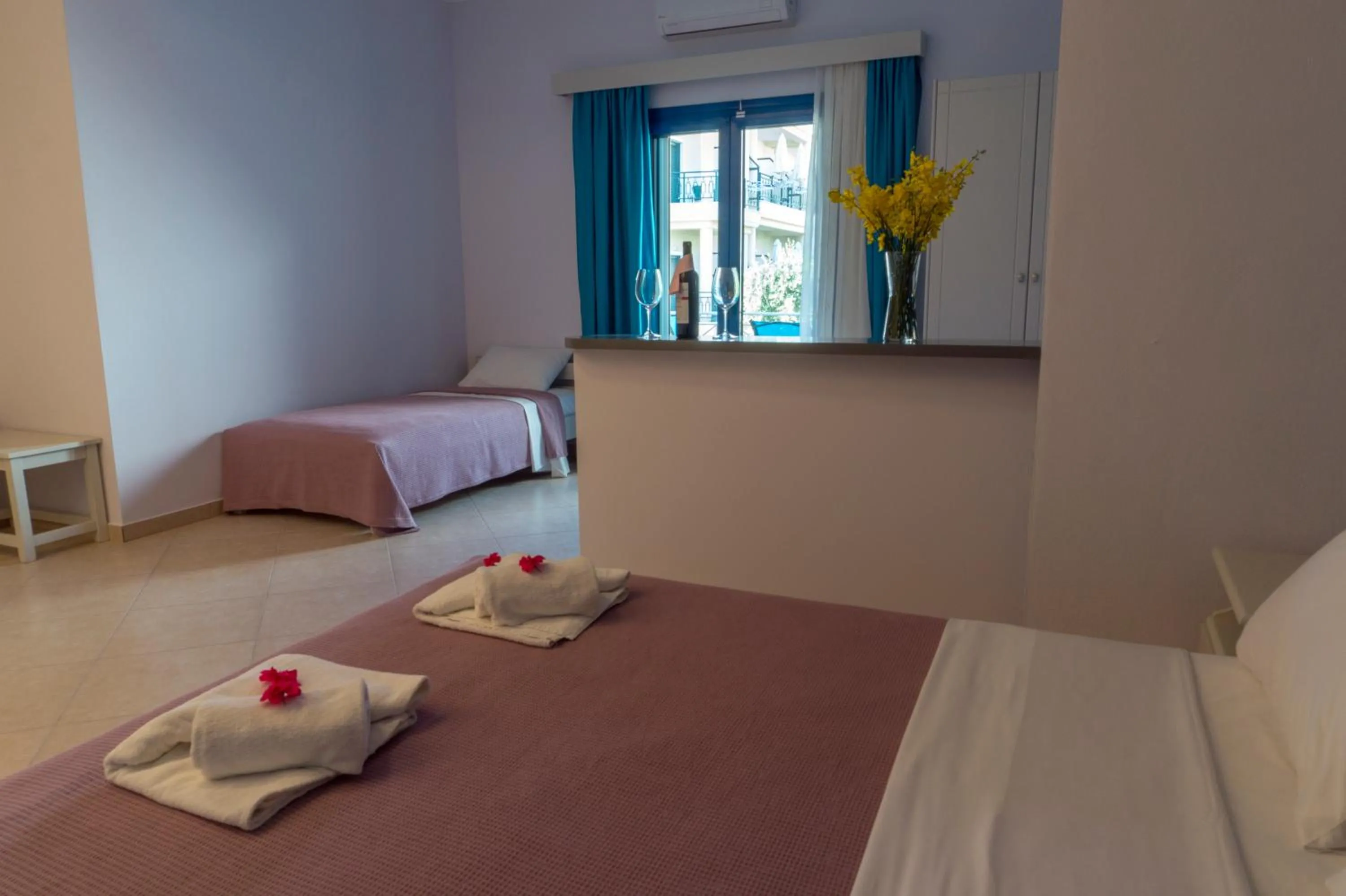 Bed in Hotel Loukas Vrachos