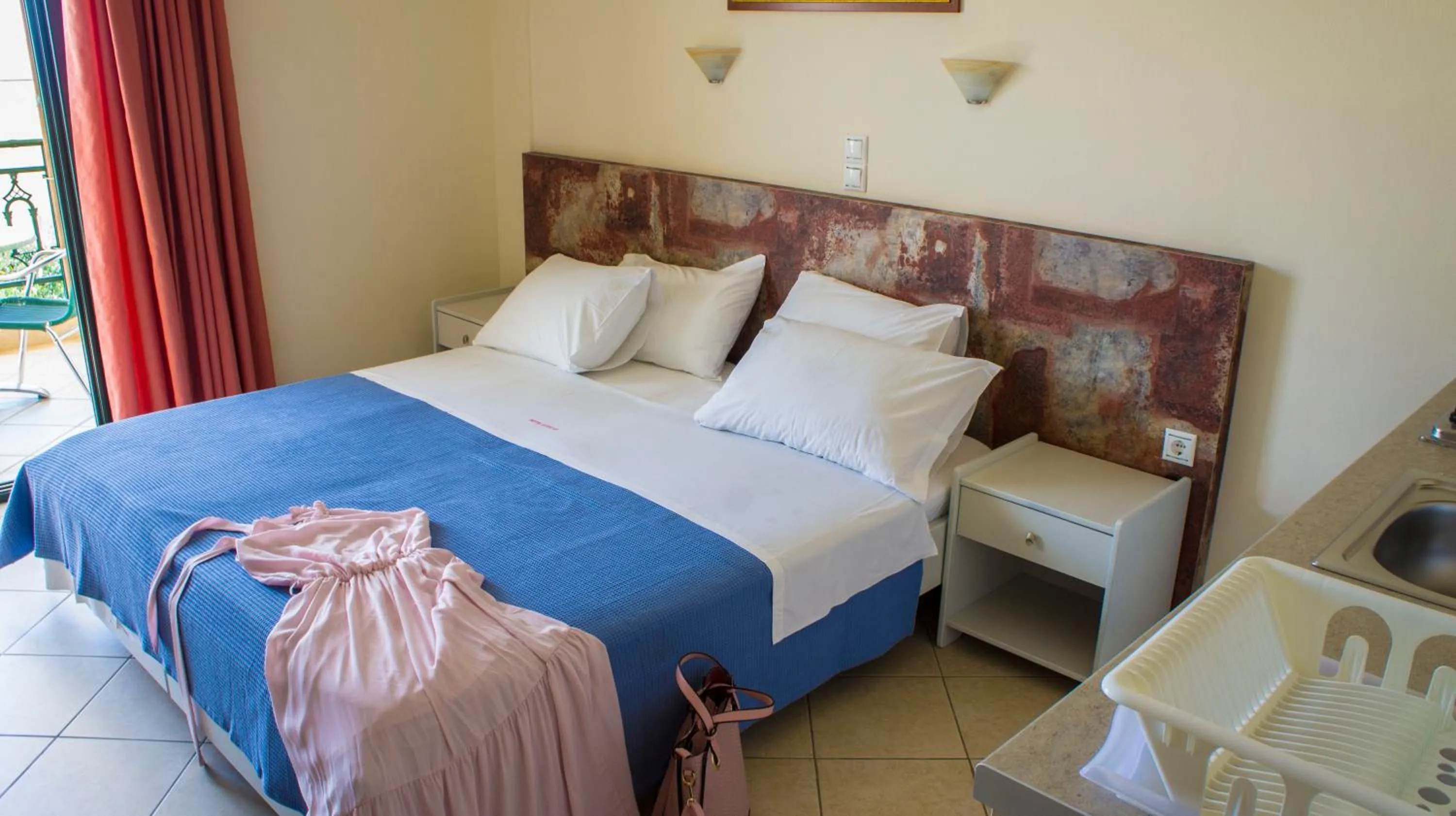 Bed in Hotel Loukas Vrachos