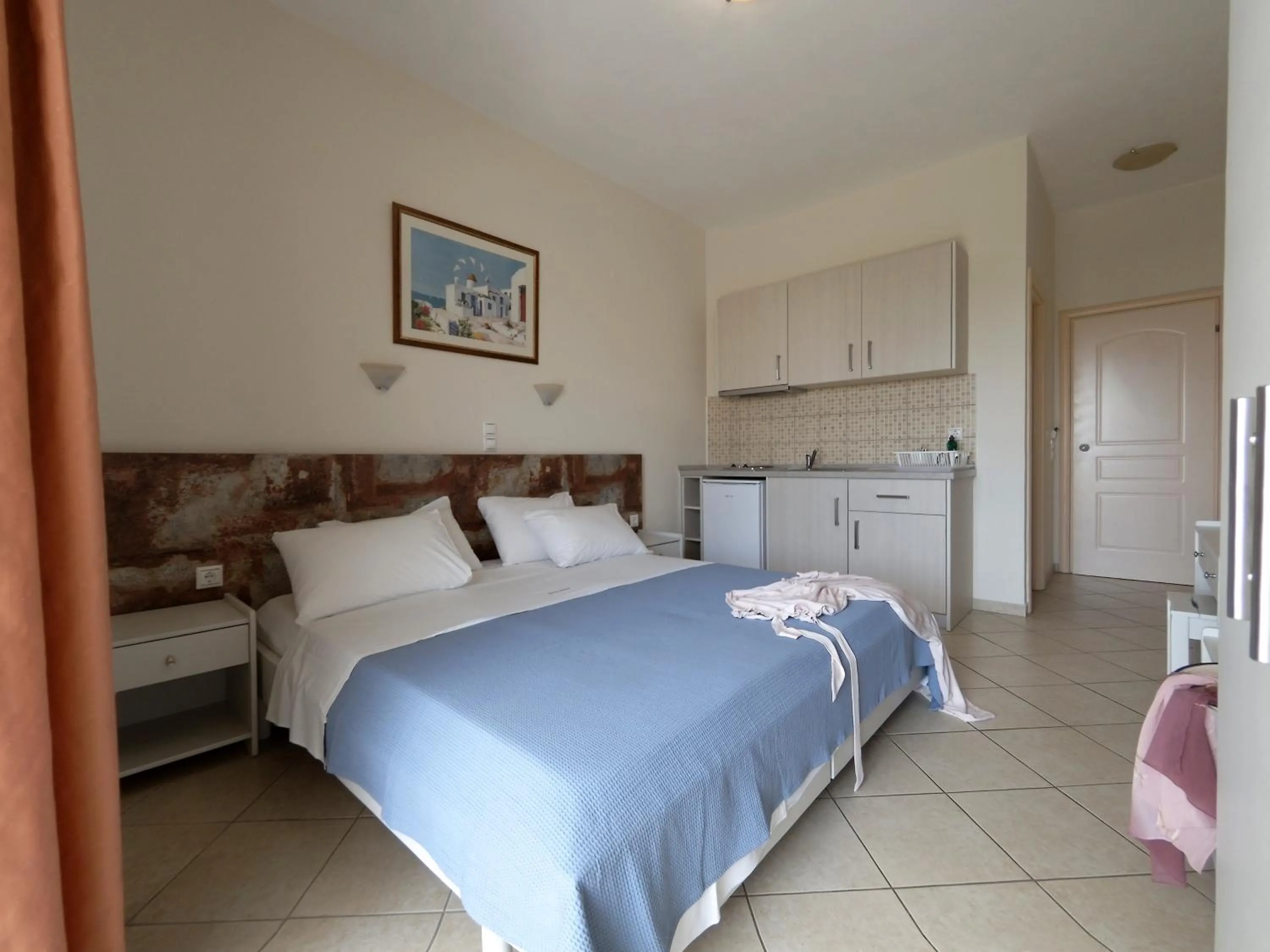Bed in Hotel Loukas Vrachos