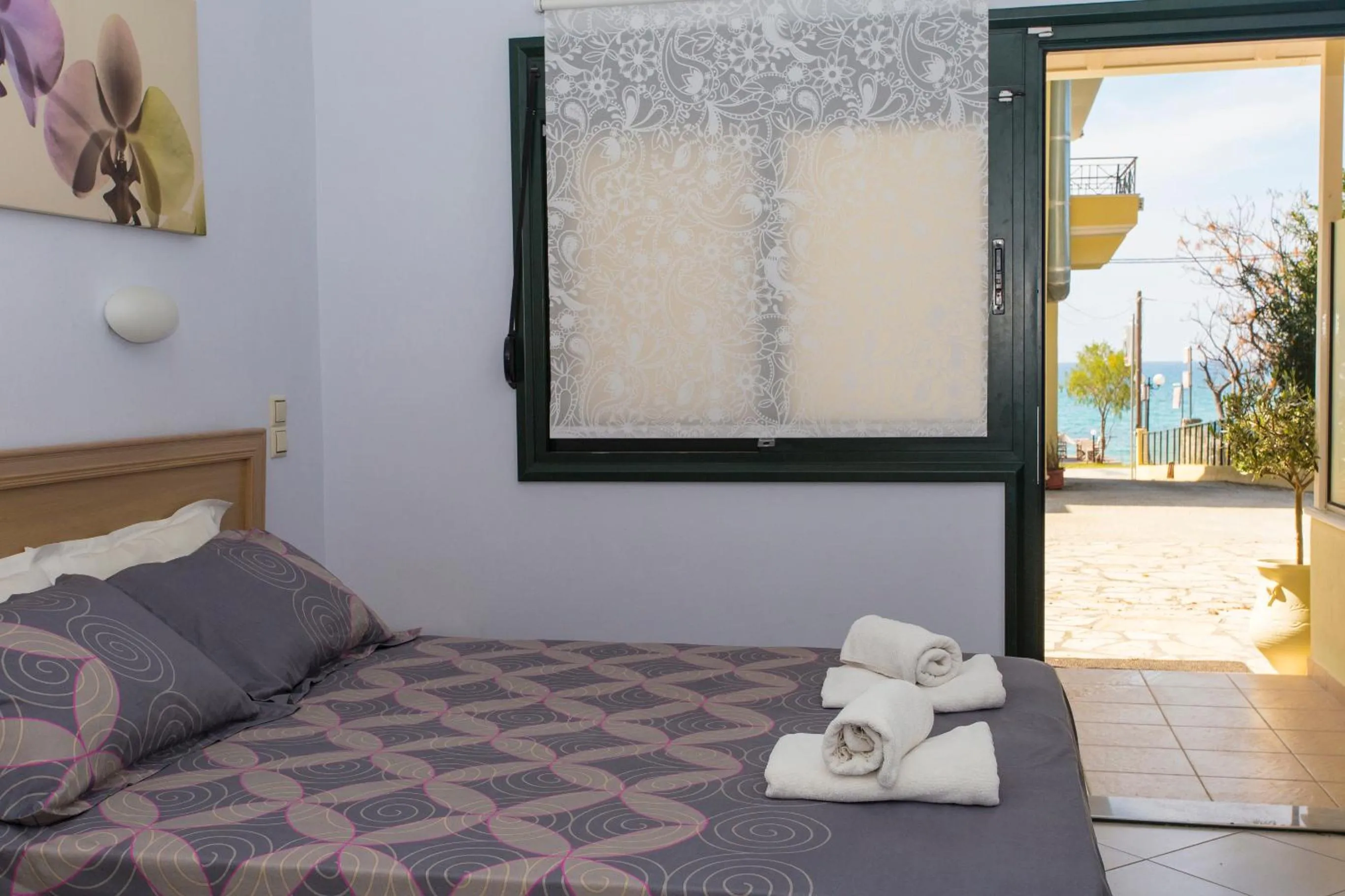 Bed in Hotel Loukas Vrachos