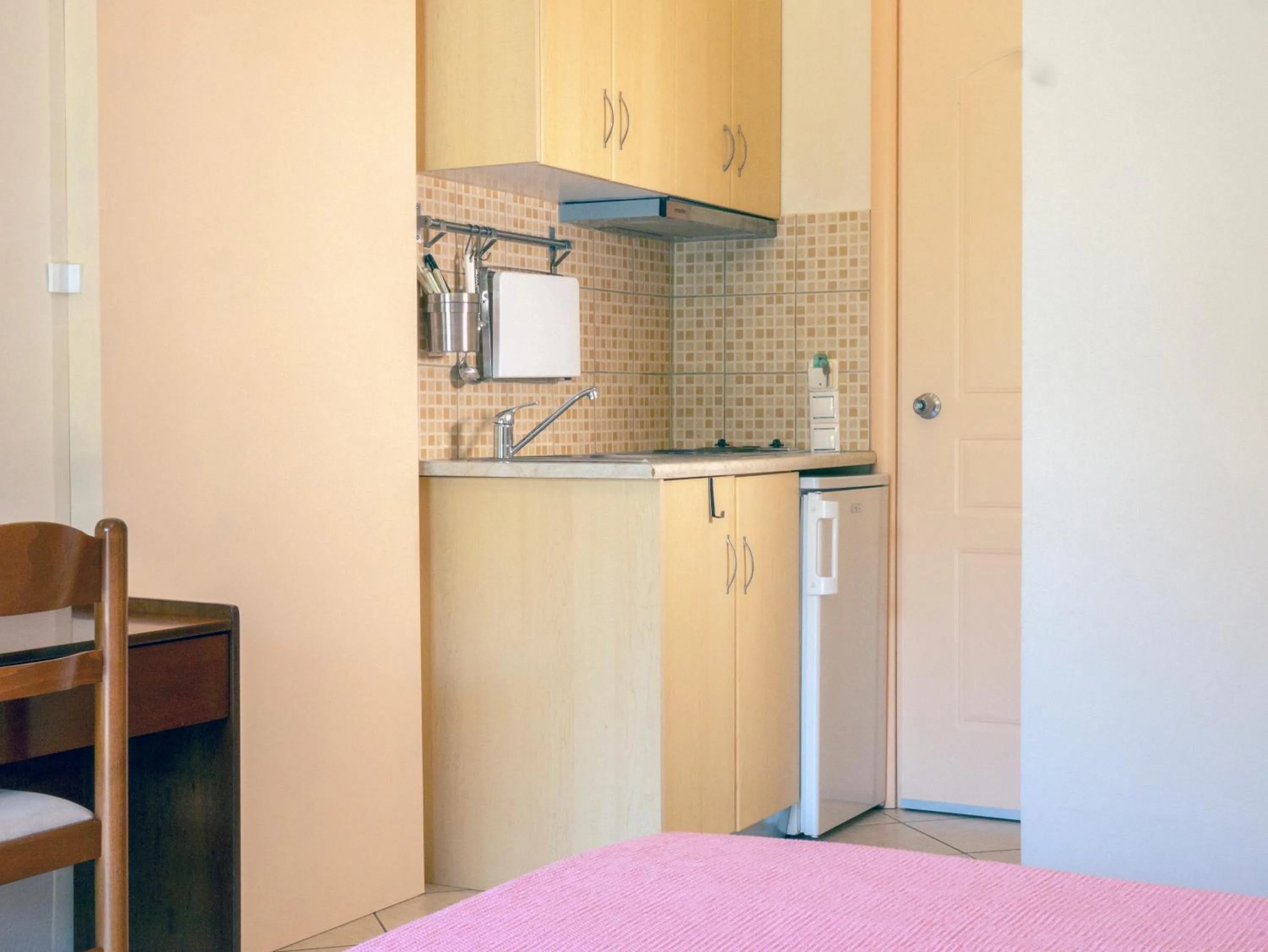 Kitchen or kitchenette in Hotel Loukas Vrachos