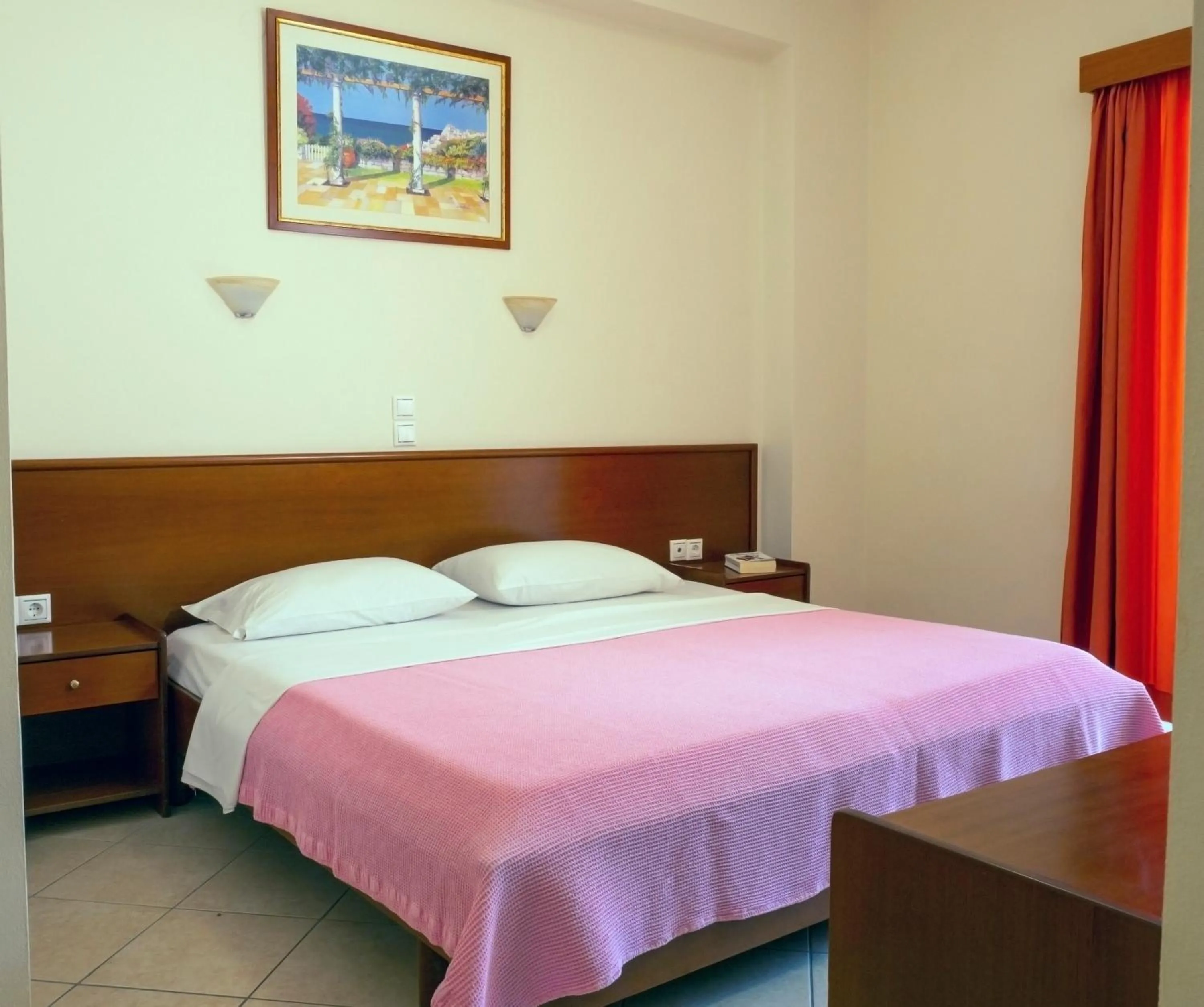 Bed in Hotel Loukas Vrachos