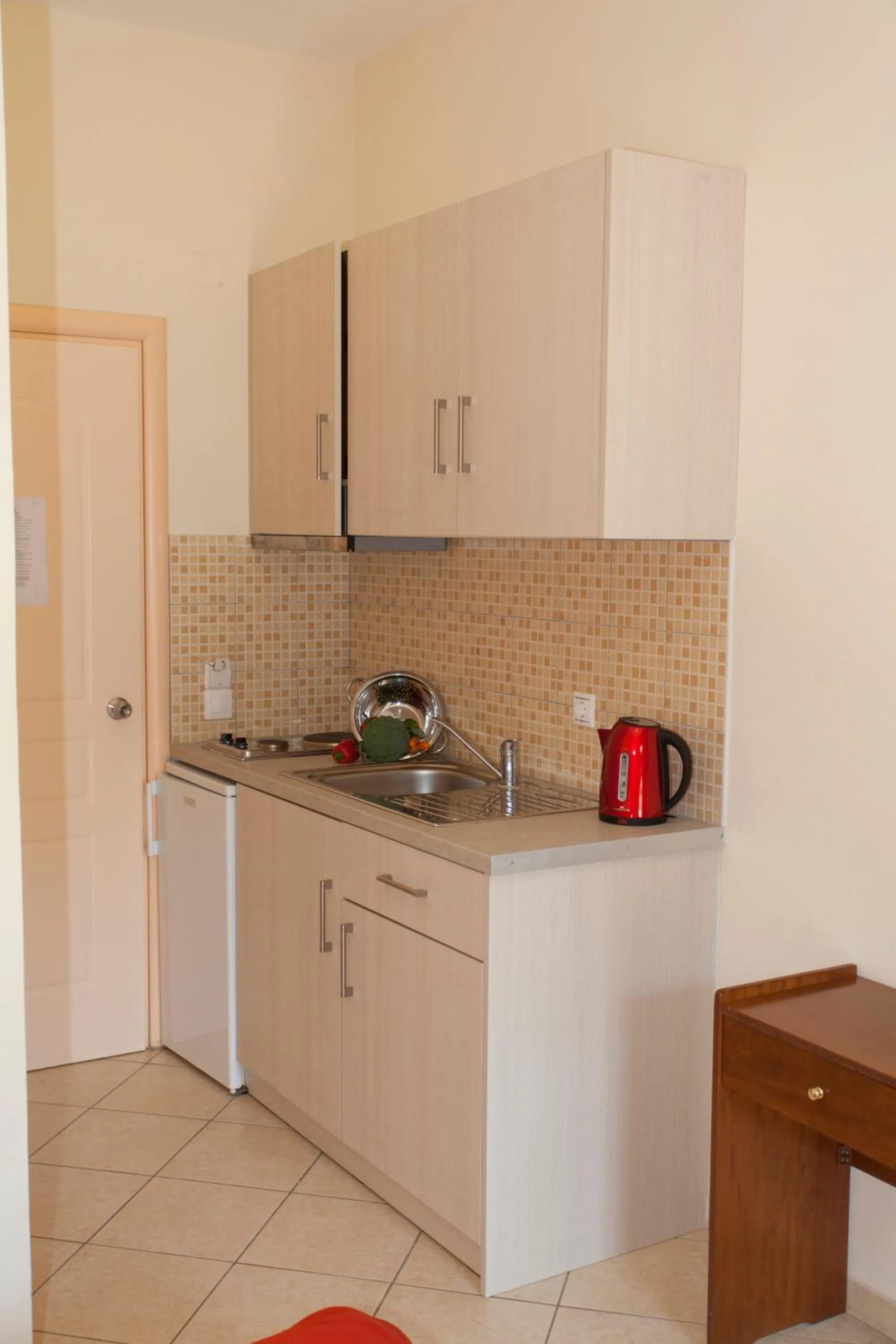 Kitchen or kitchenette in Hotel Loukas Vrachos