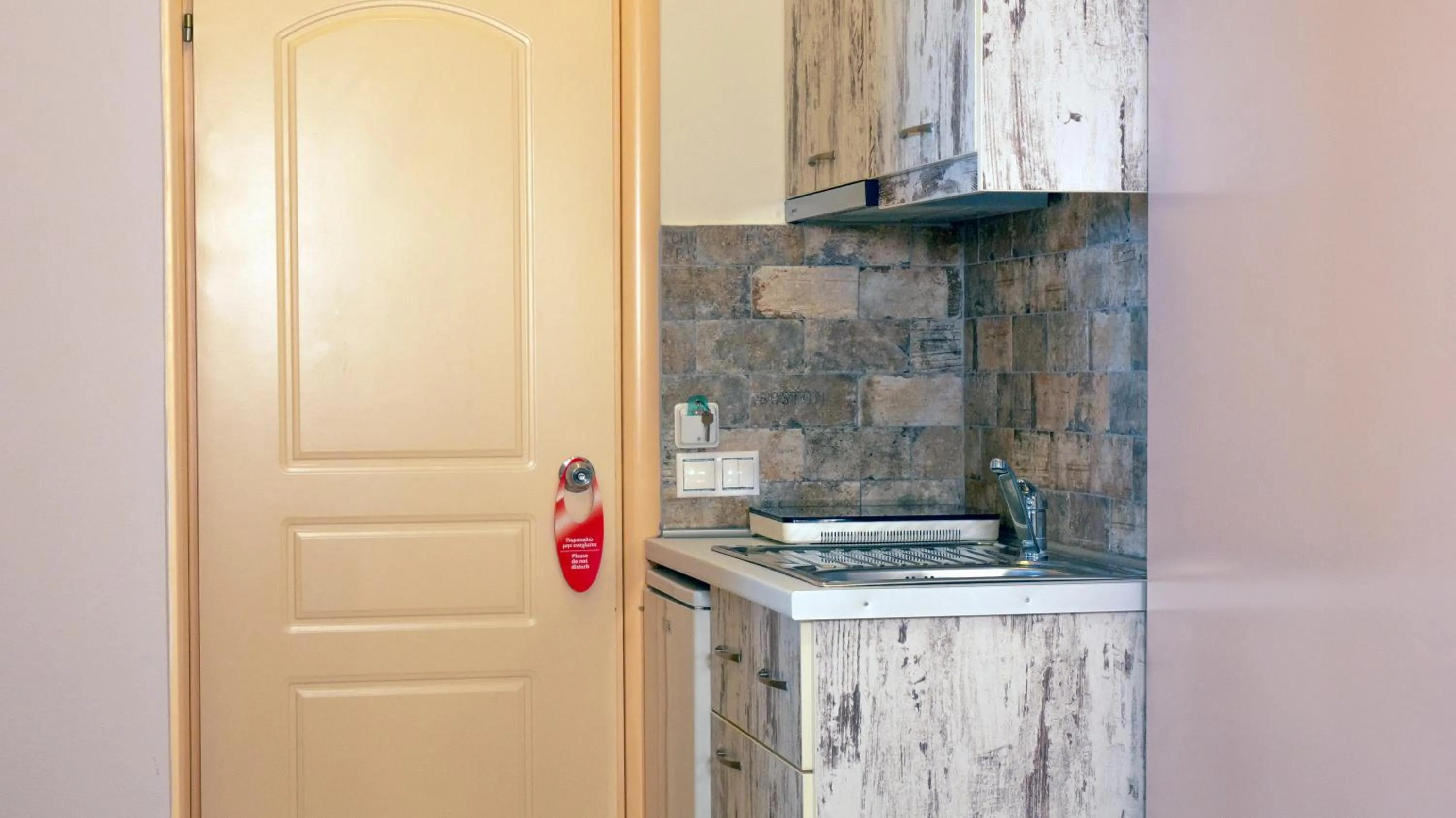 Kitchen or kitchenette in Hotel Loukas Vrachos