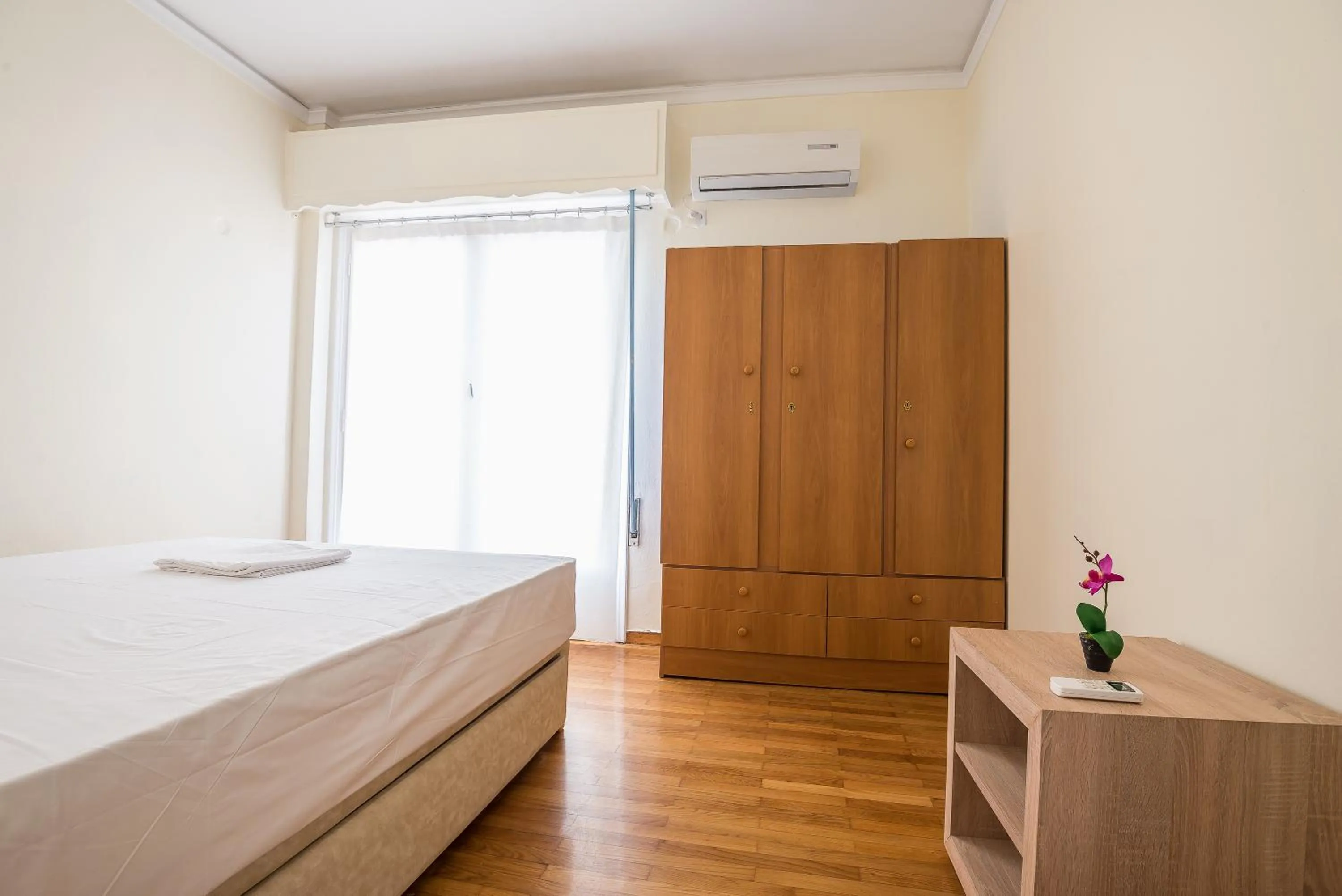 Bed in Acropolis View Paradise Apartments