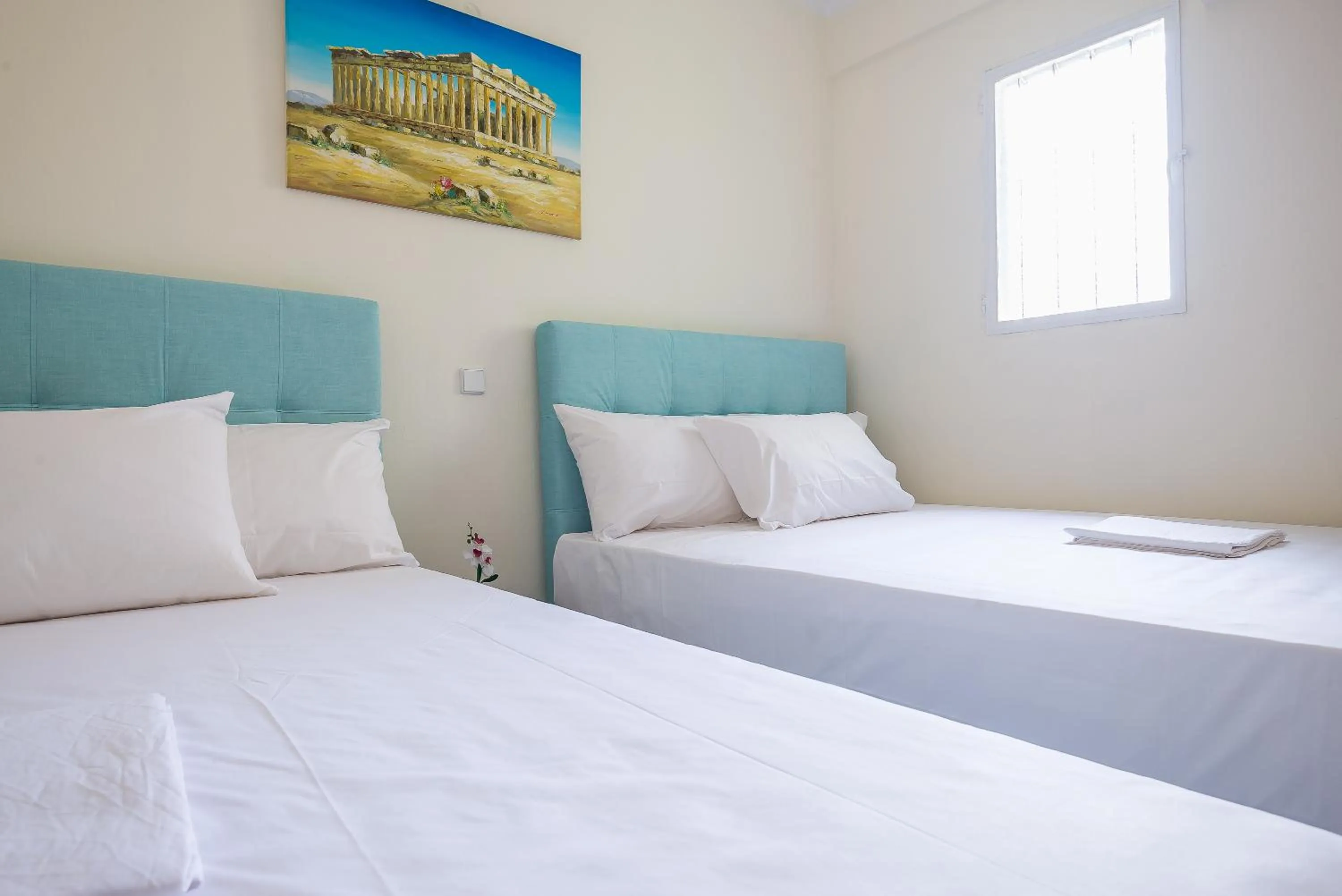 Bed in Acropolis View Paradise Apartments