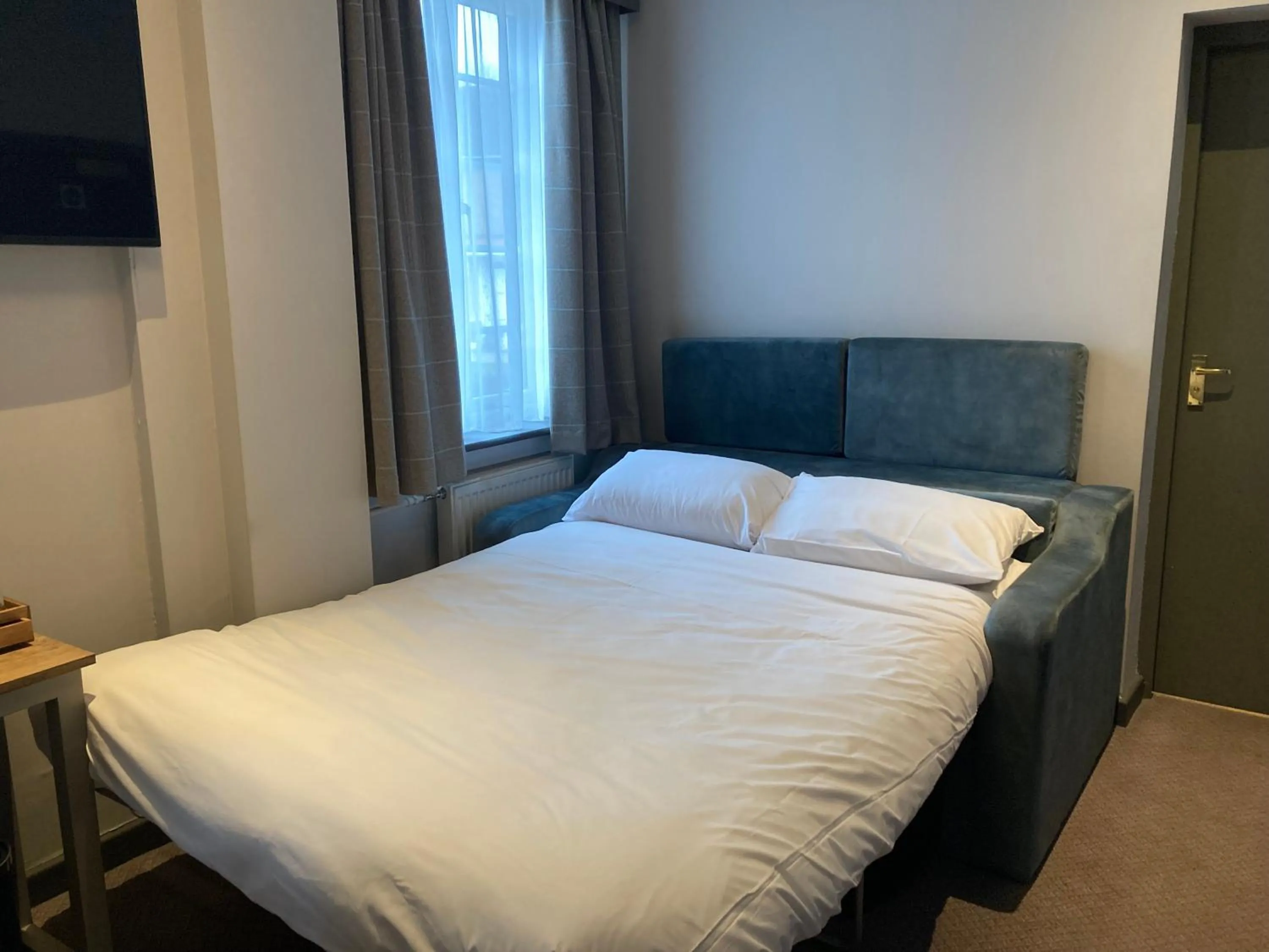 Bed in The Abbey Inn