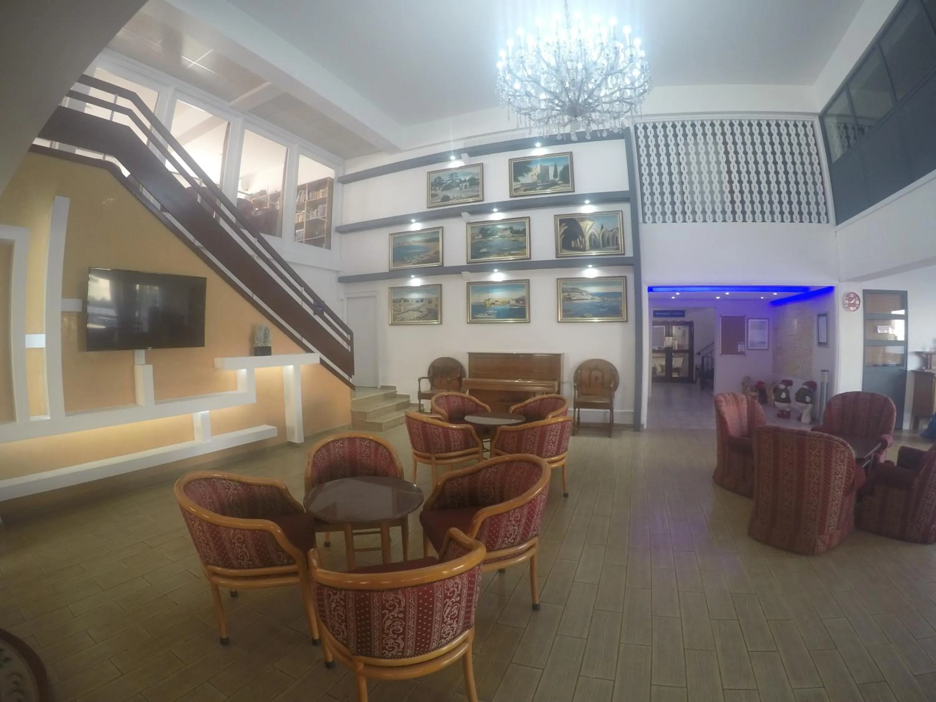 Communal lounge/ TV room in Asty Hotel