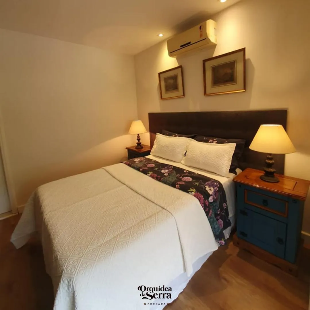 Bed in Pousada Orquidea da Serra