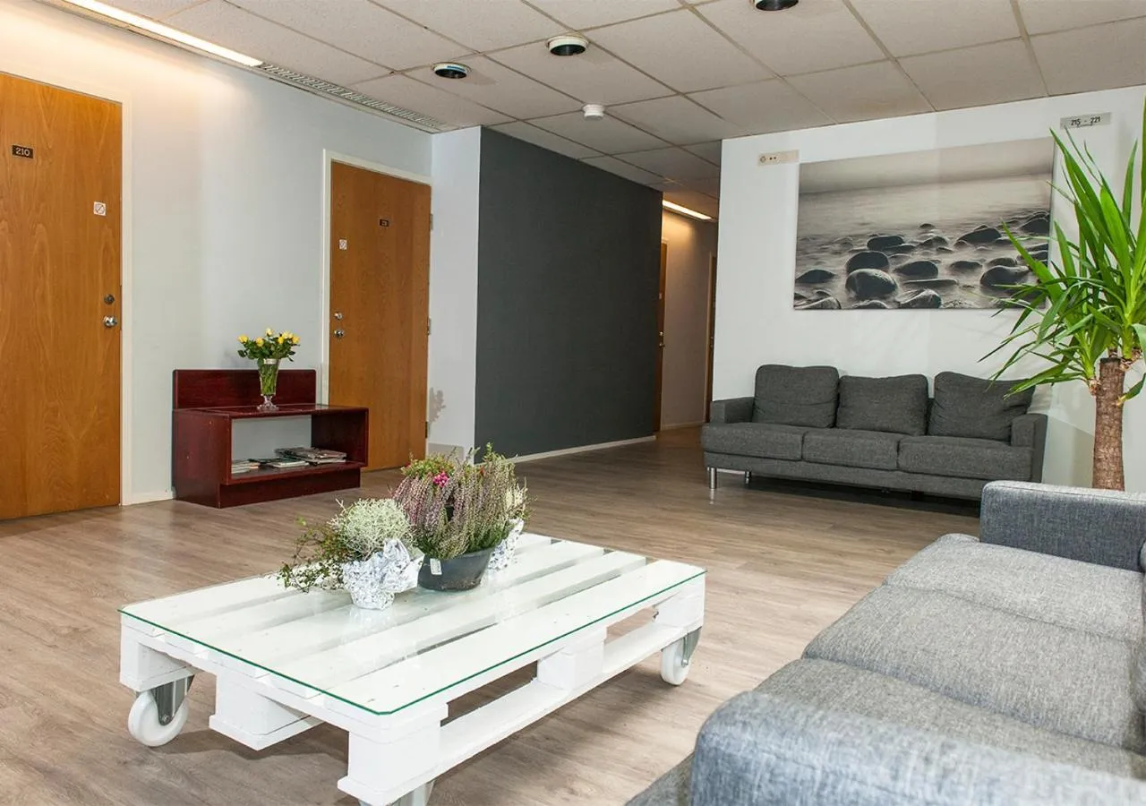 Communal lounge/ TV room in Hotelli & Ravintola Martinhovi